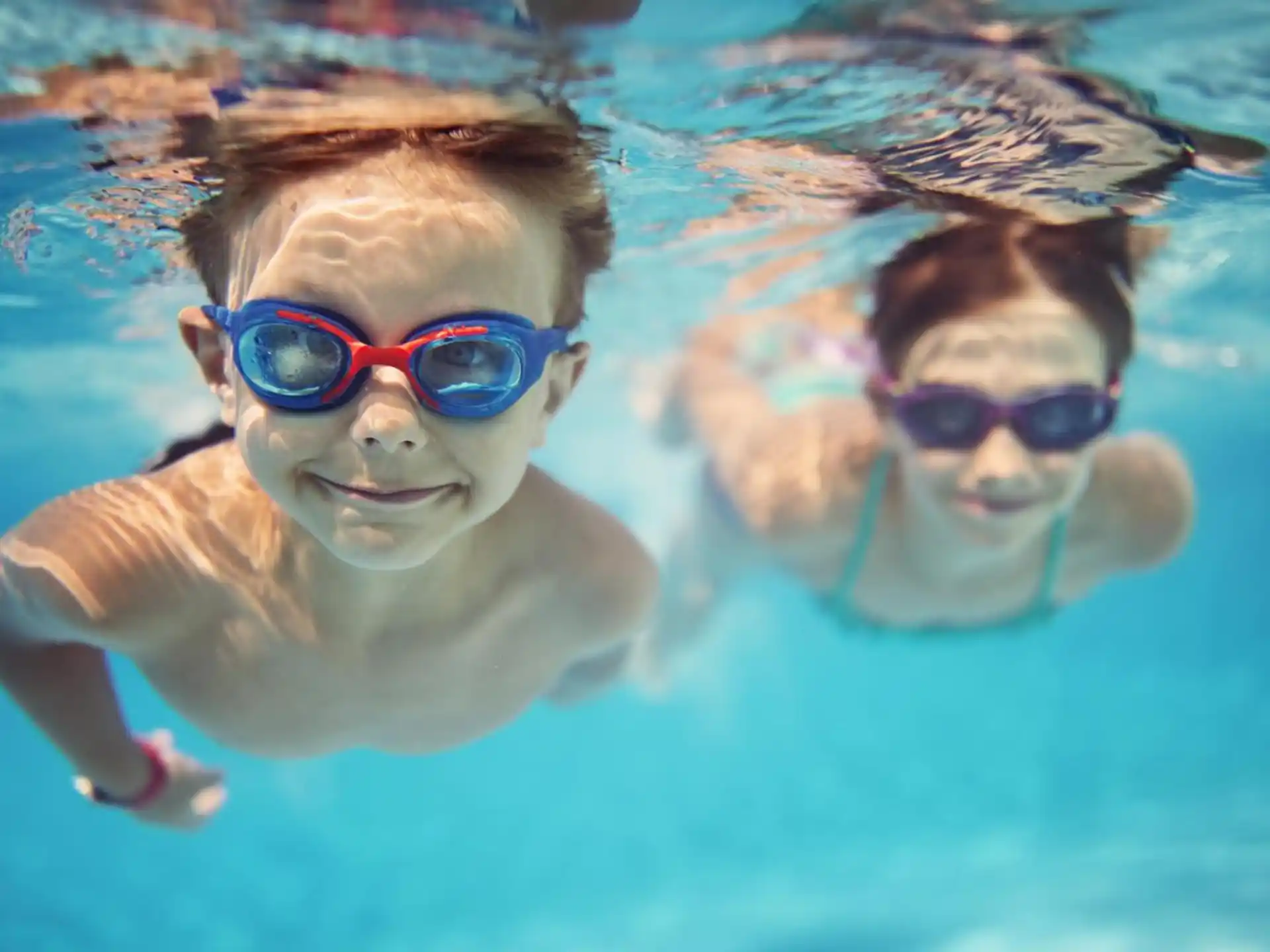 a man and a woman swimming
