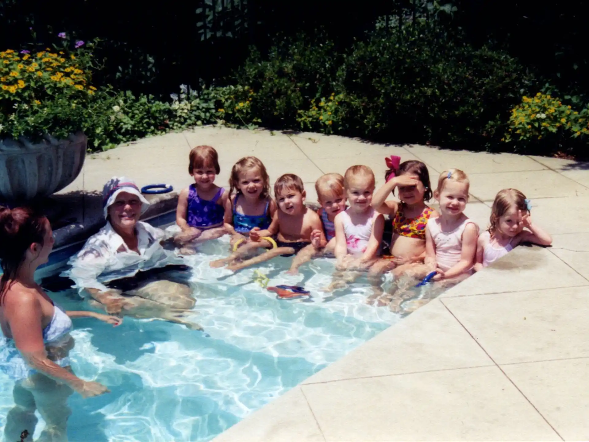 a group of people in a pool