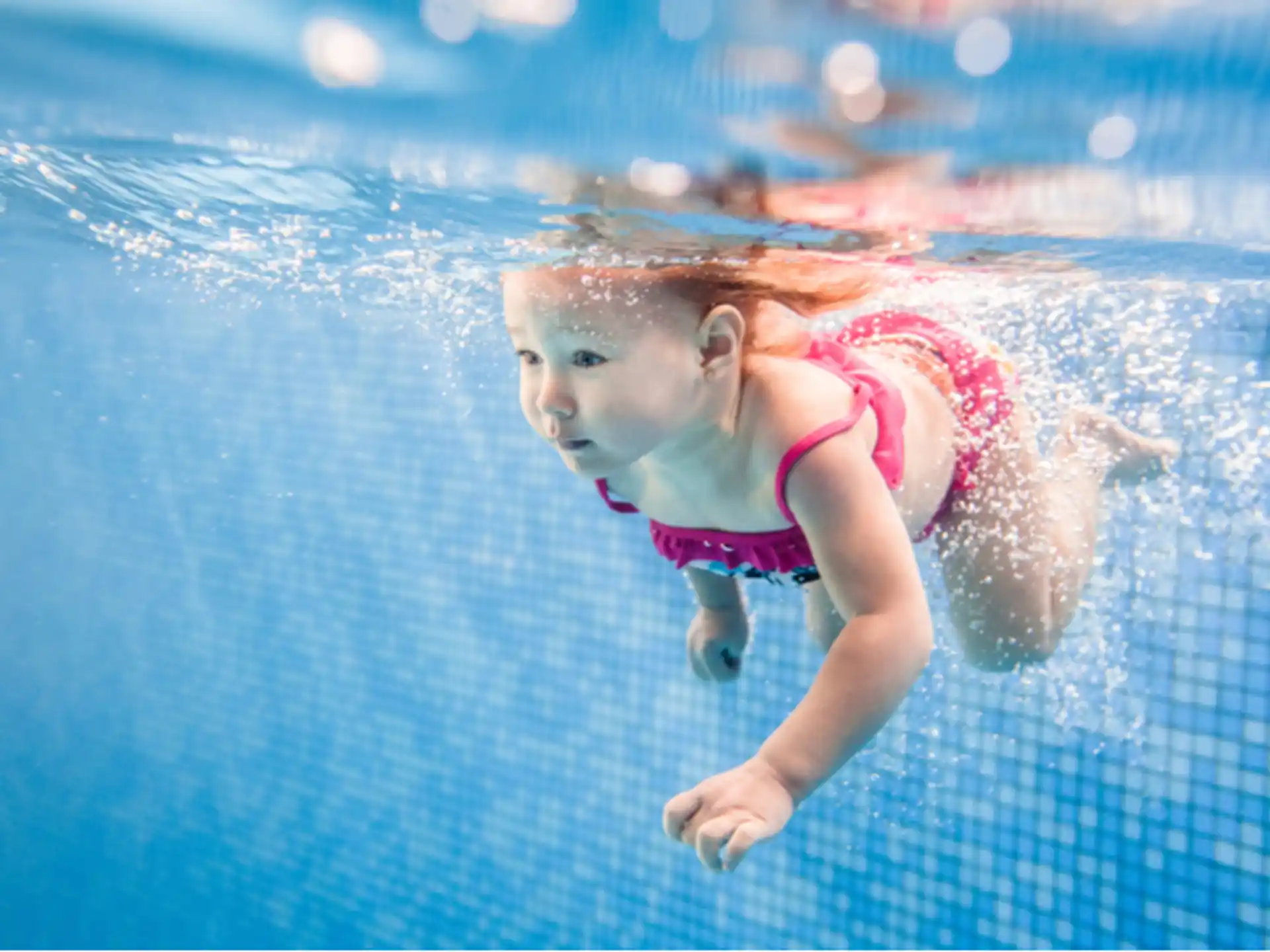 a girl in a pool