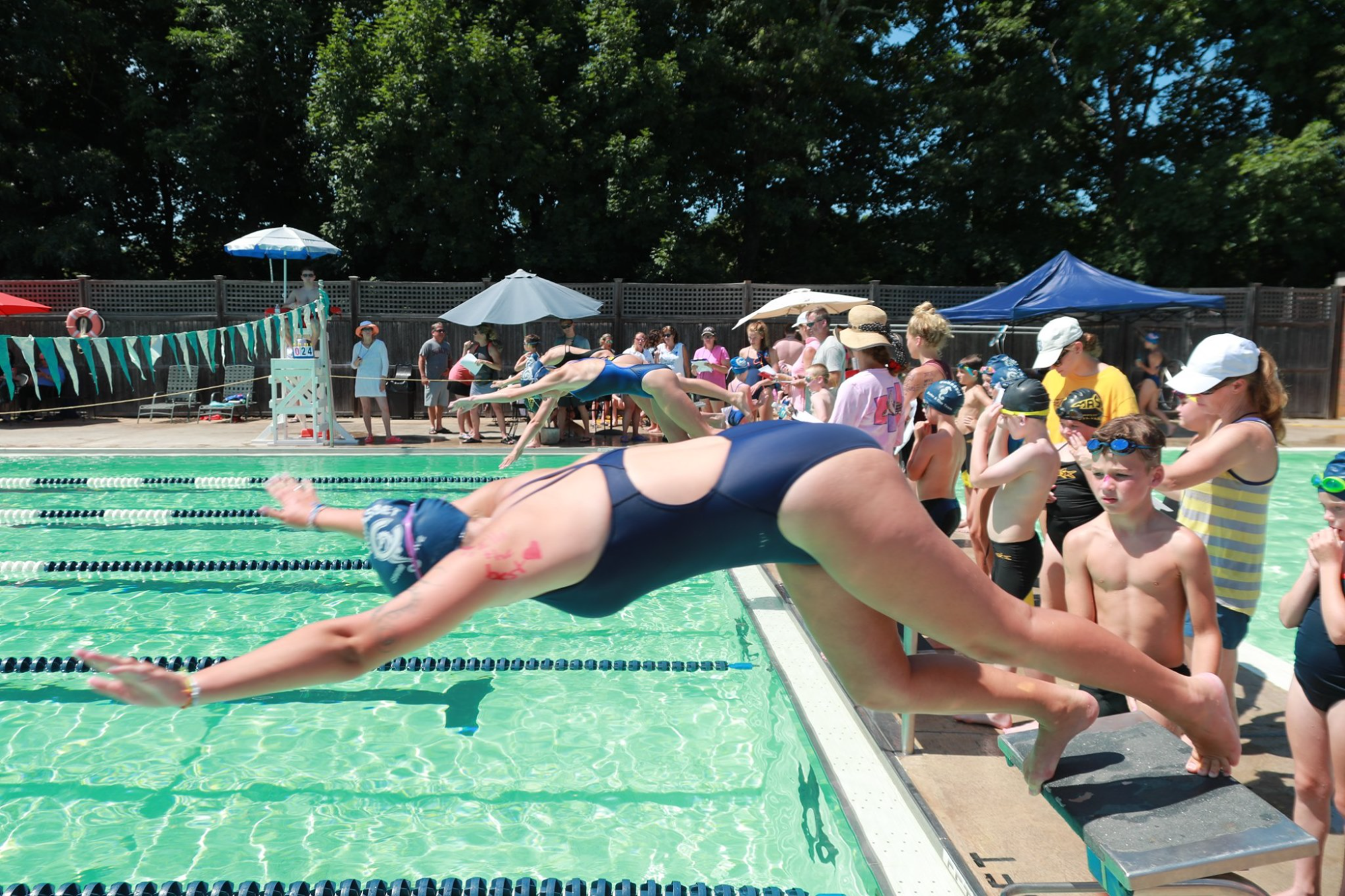 a group of people in a pool