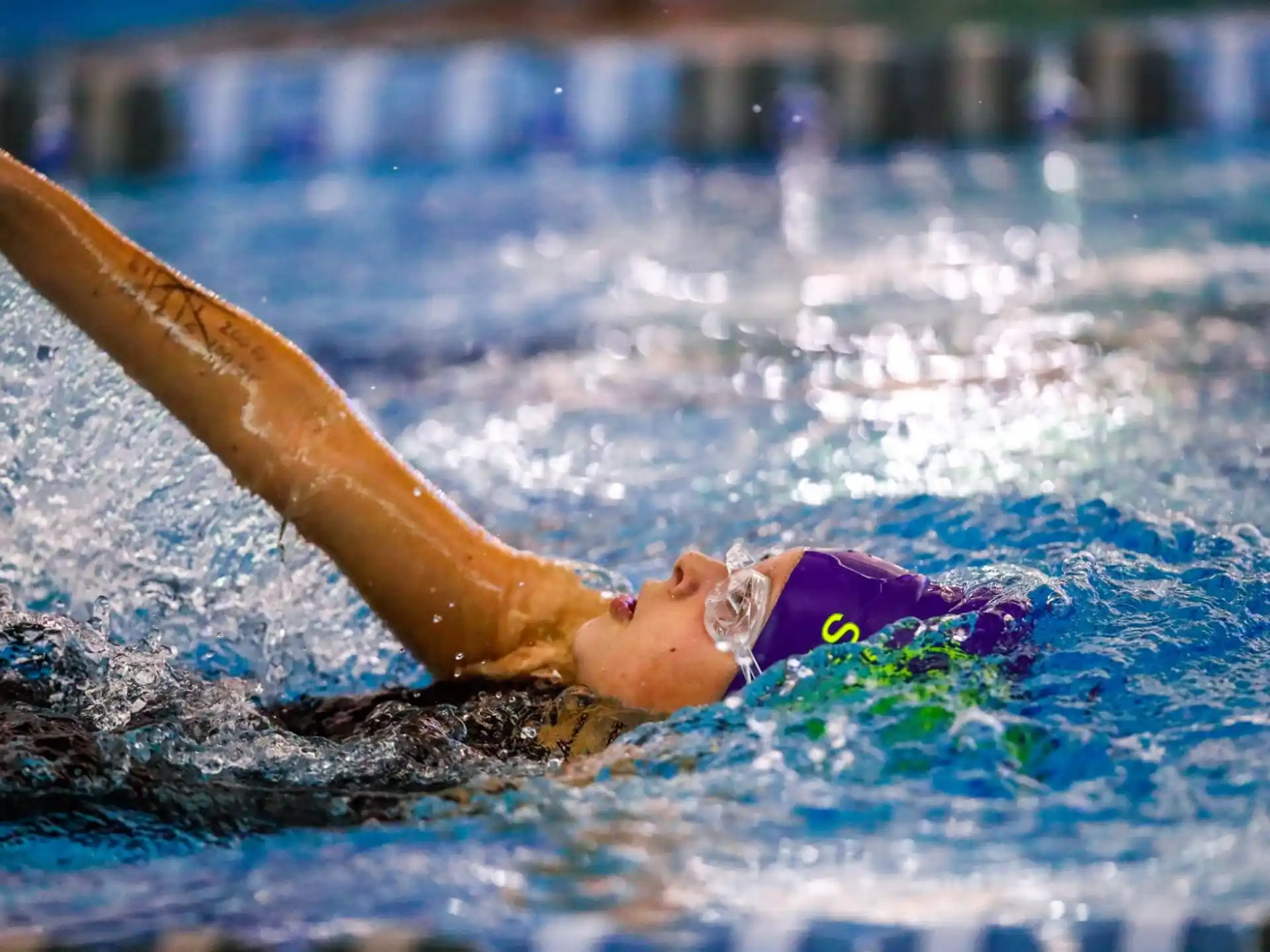 a person swimming in a pool
