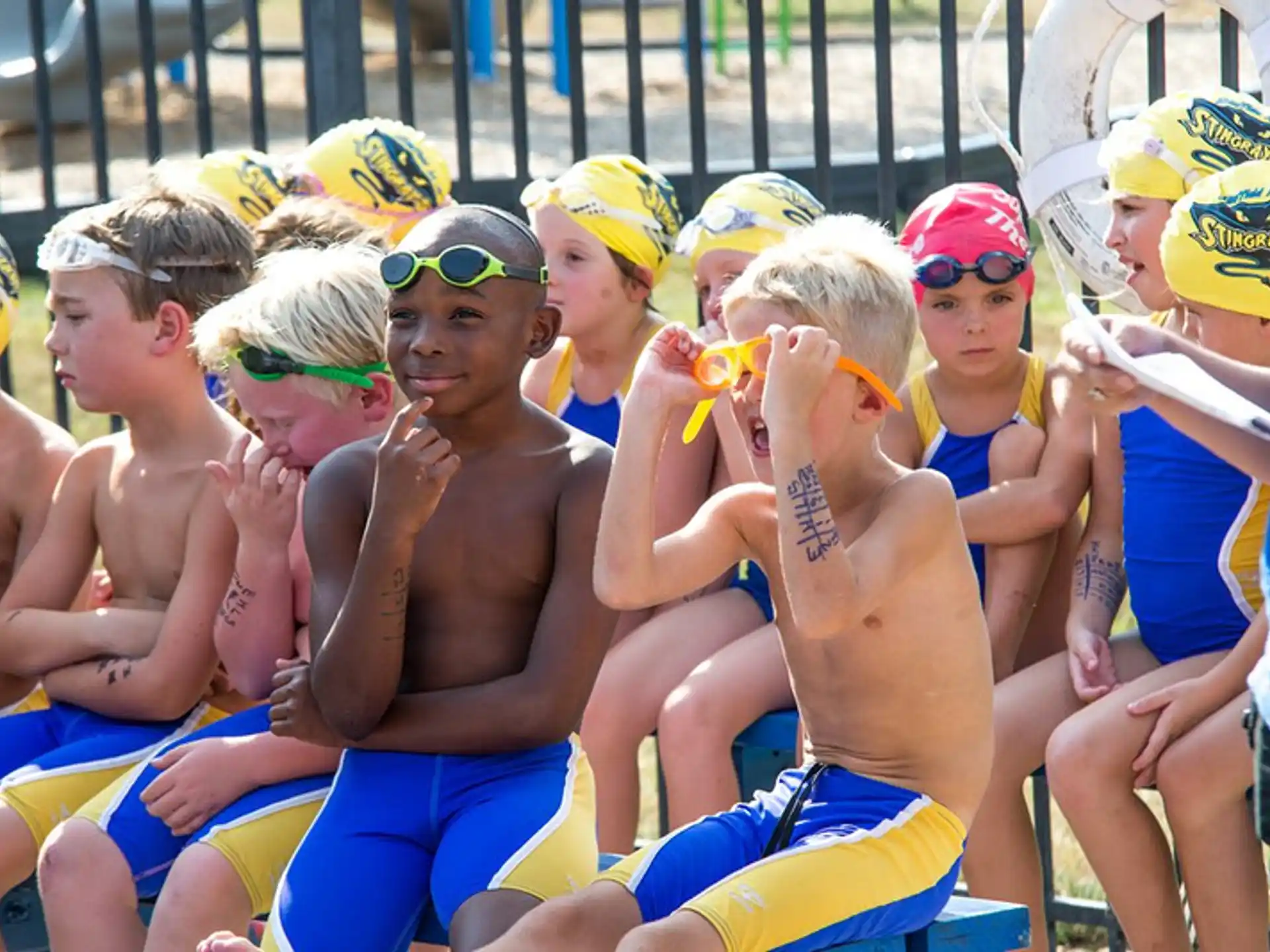 a group of people in swimsuits