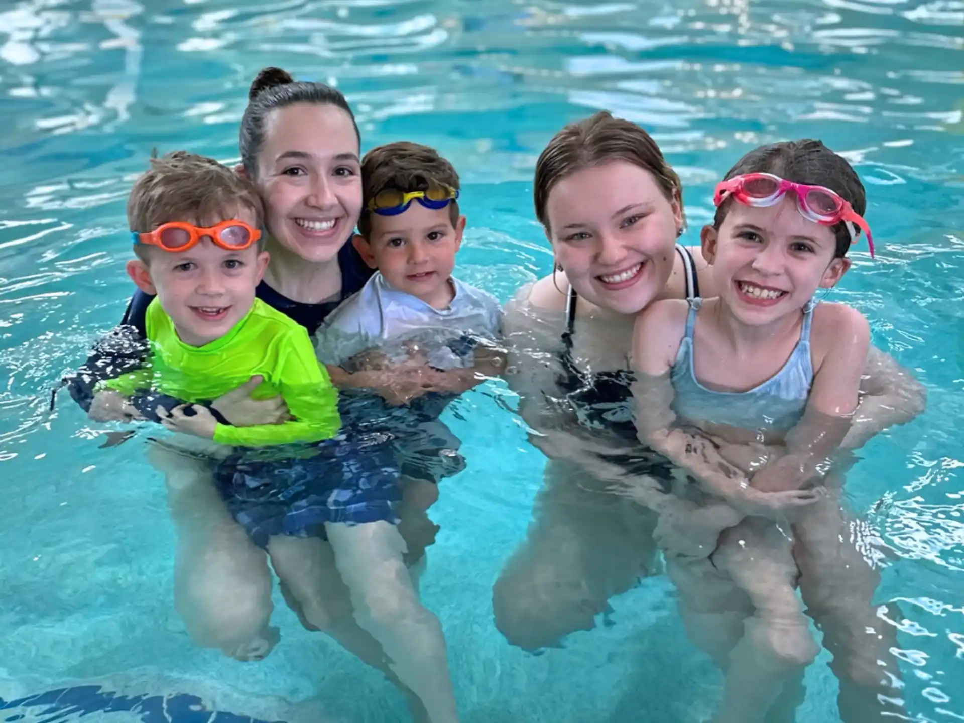 a group of people in a pool