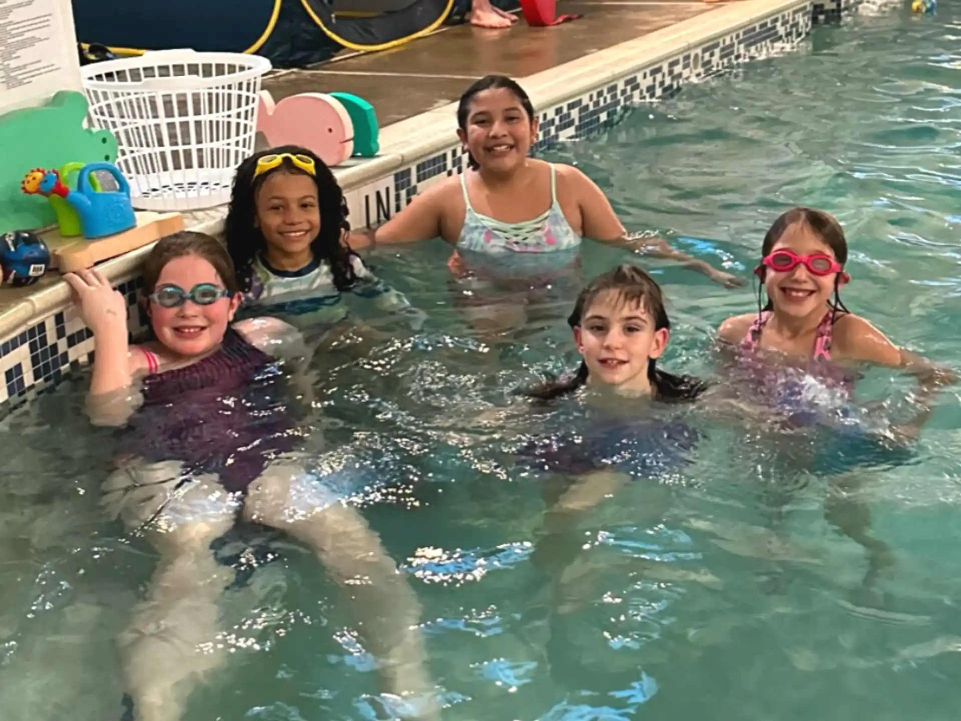 a group of people in a pool