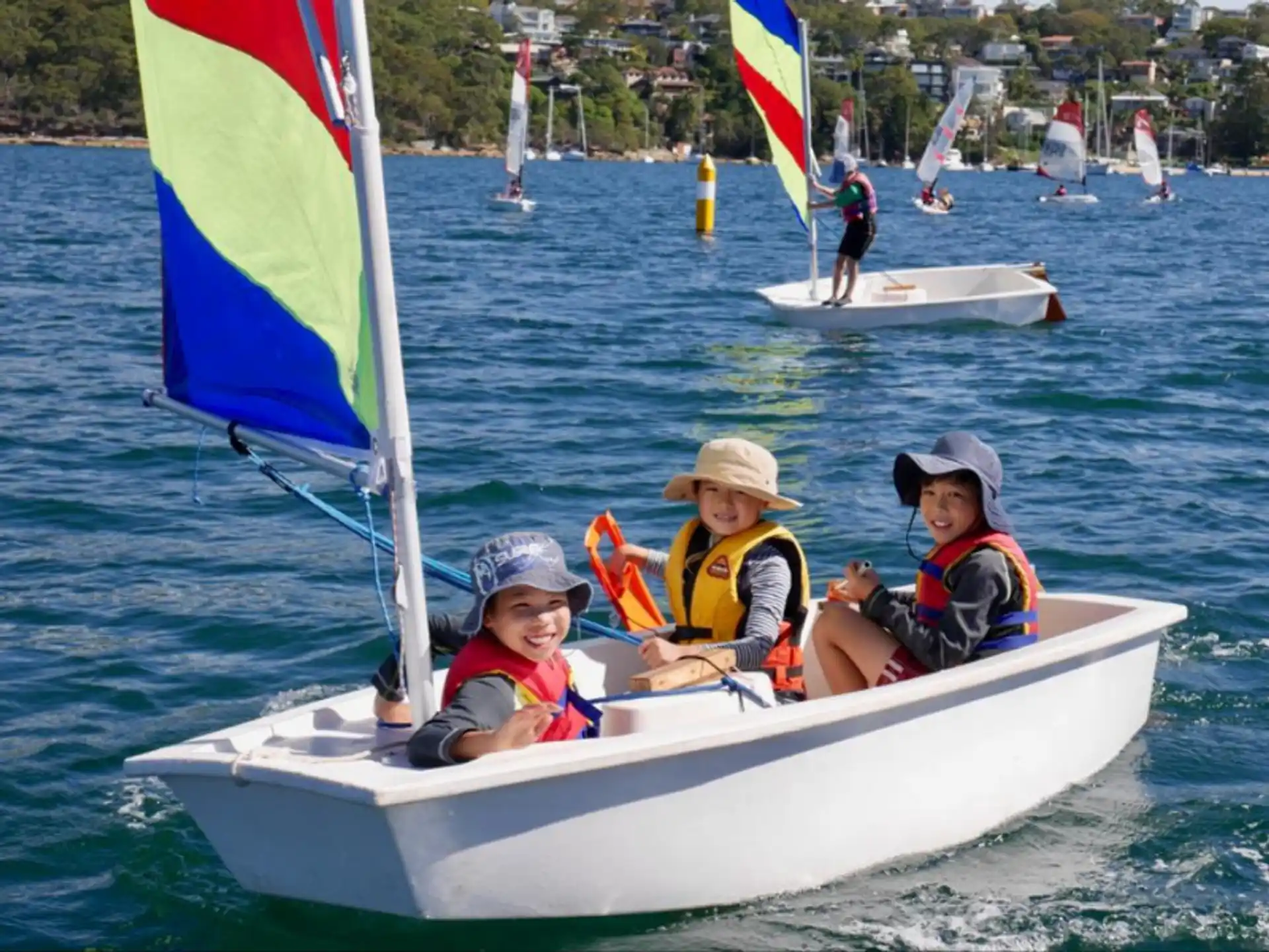 a group of people on a sailboat