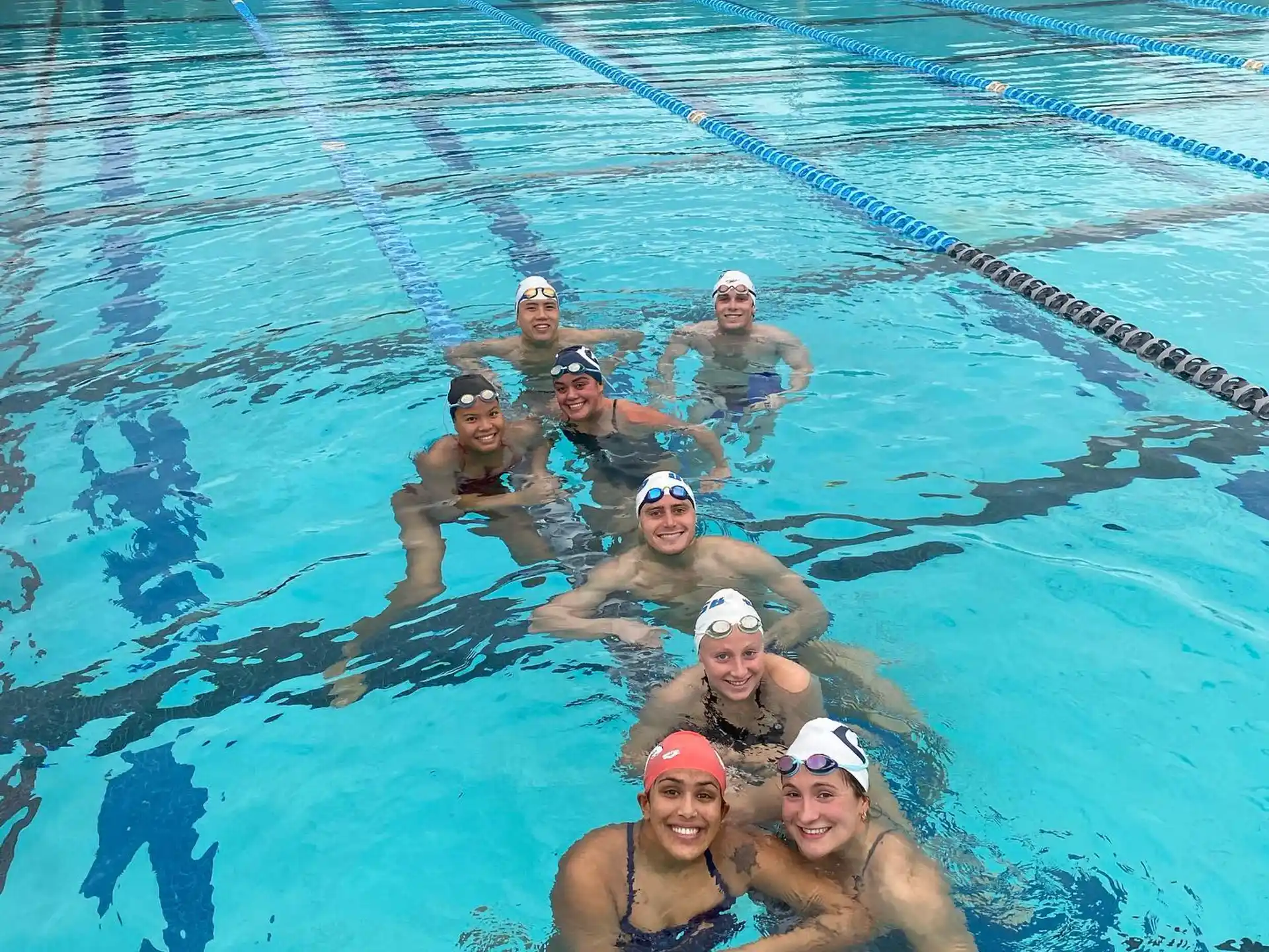 a group of people in a pool