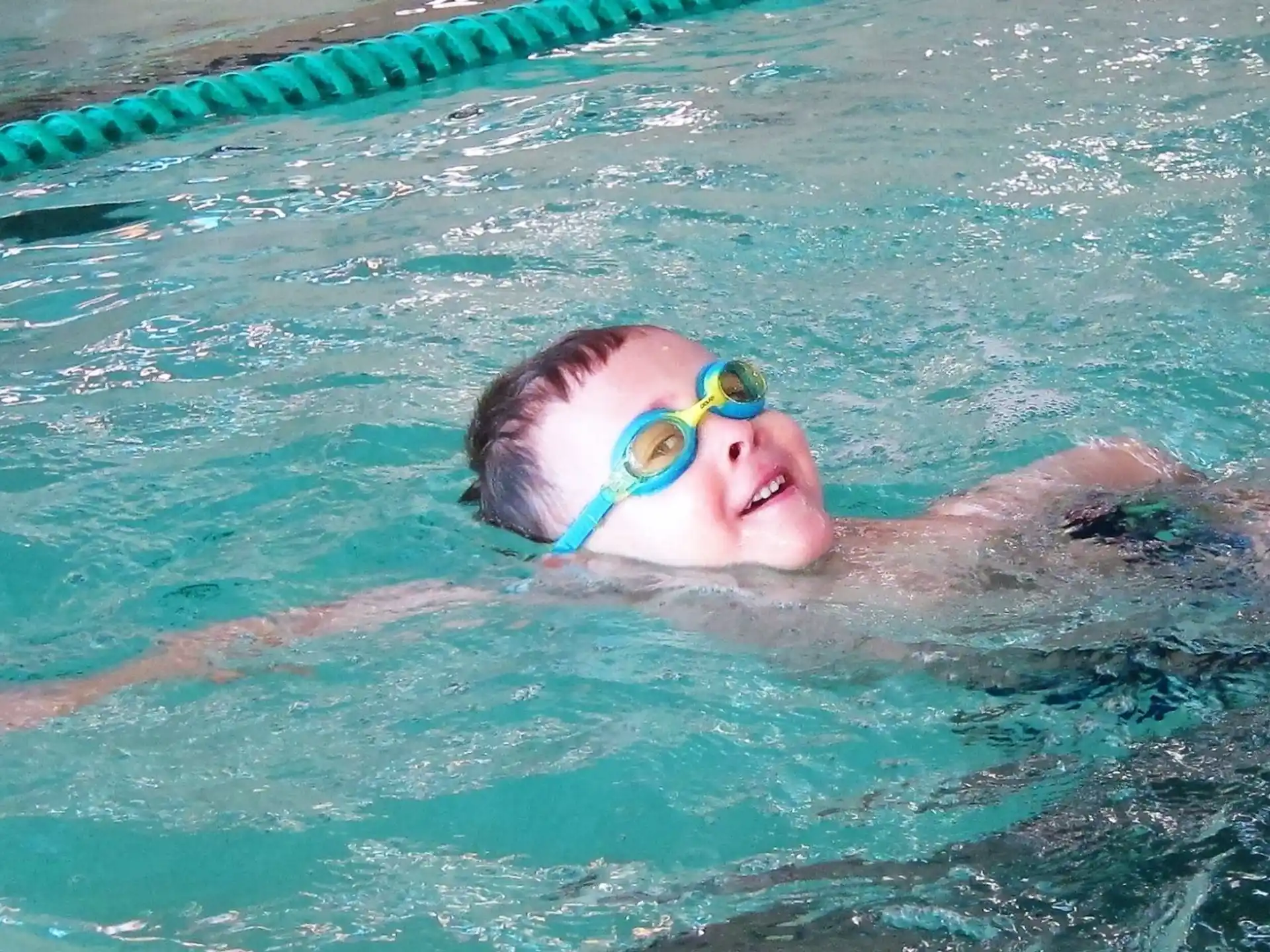 a person swimming in a pool