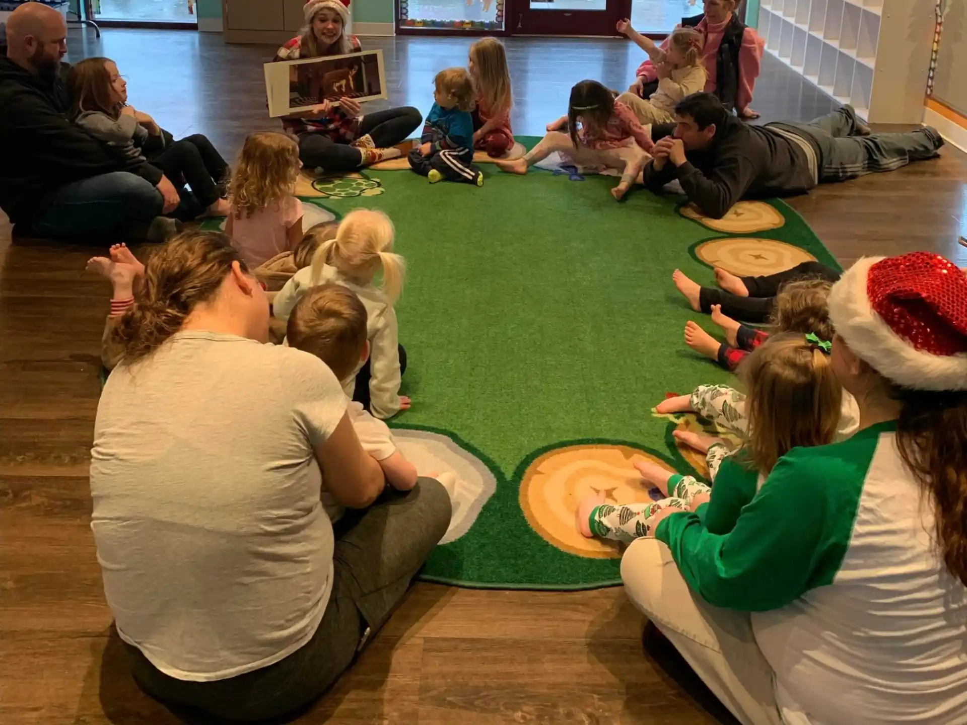 a group of people sitting on the floor