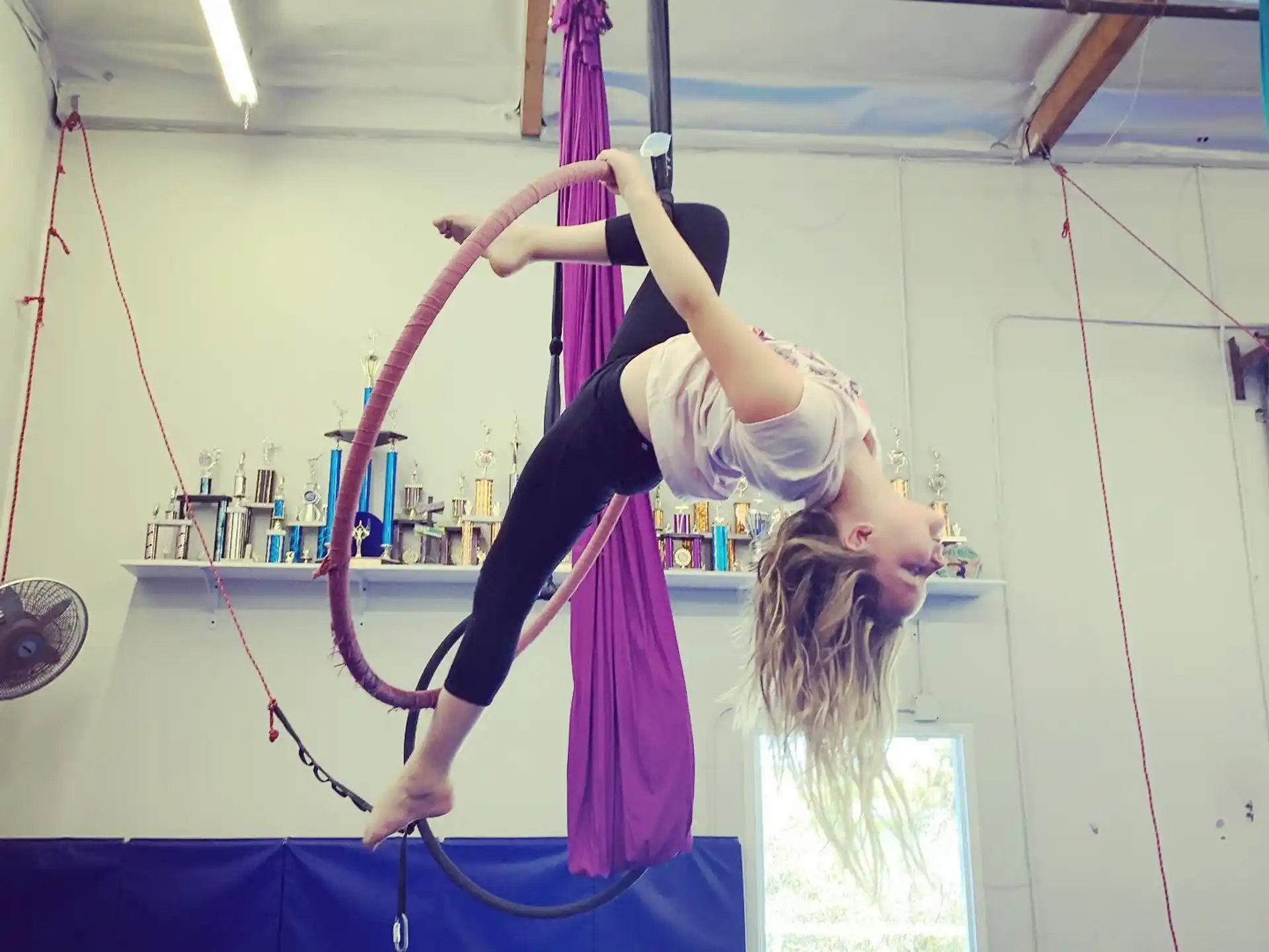 a woman doing a handstand