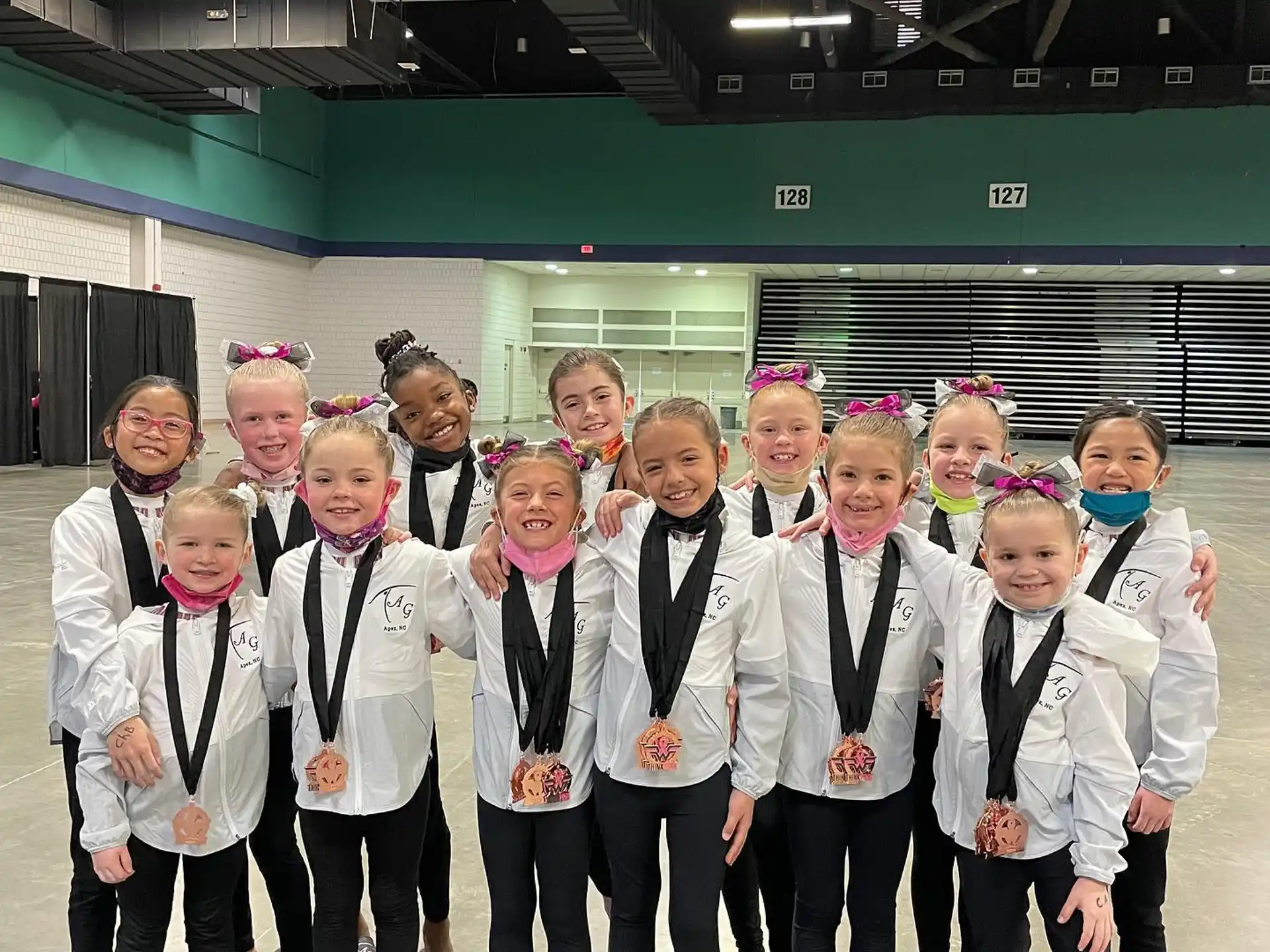 a group of people wearing matching outfits