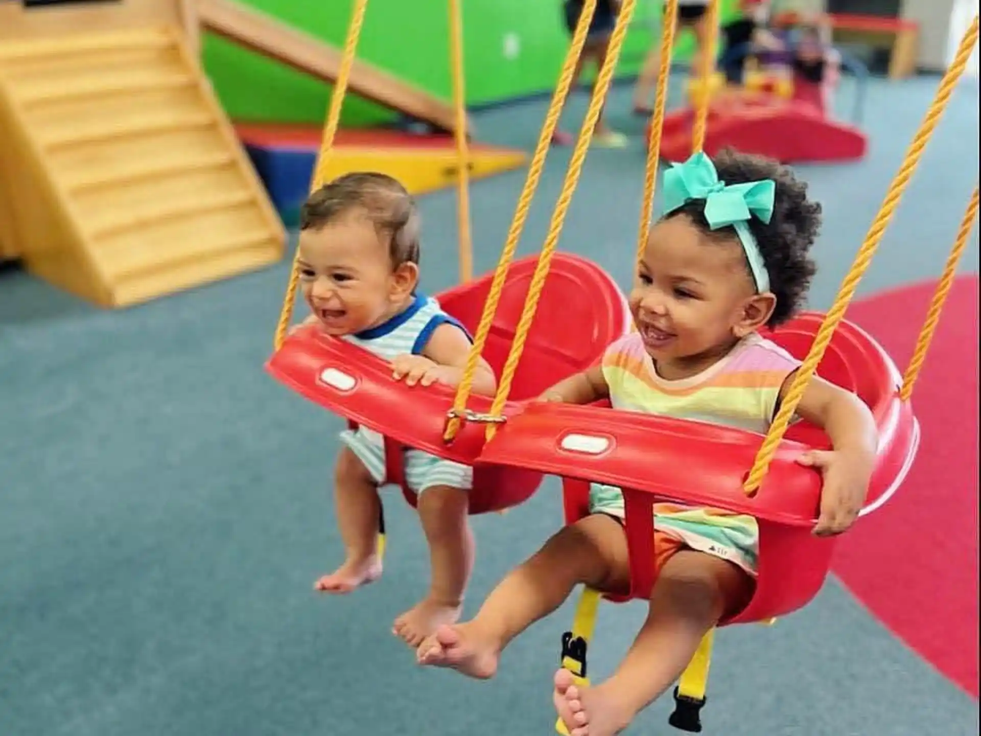 two children in a play area