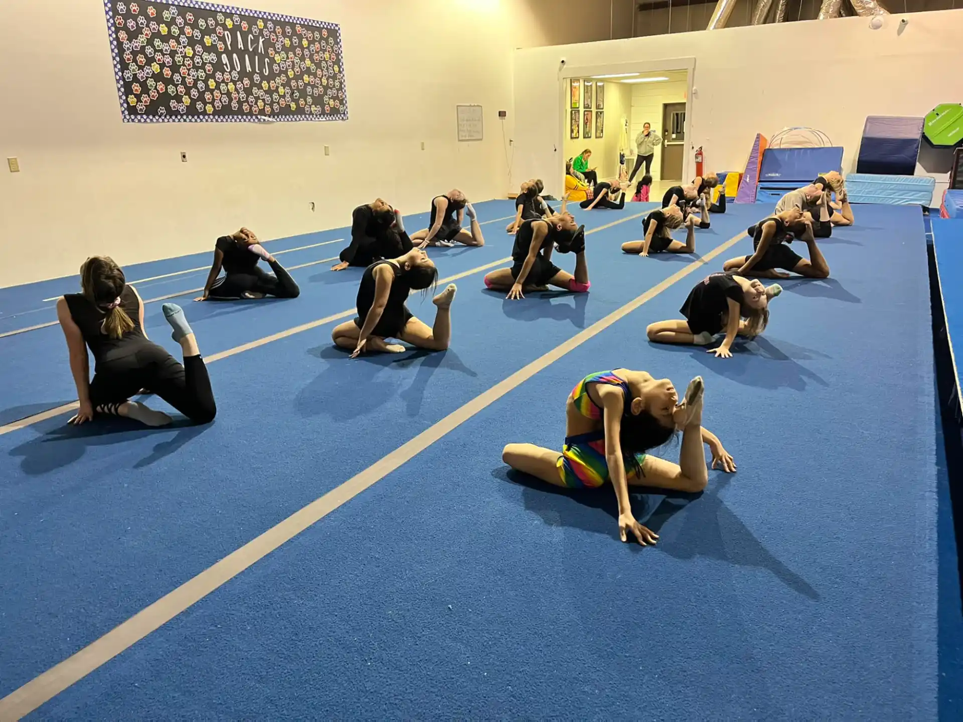 a group of people in a gym