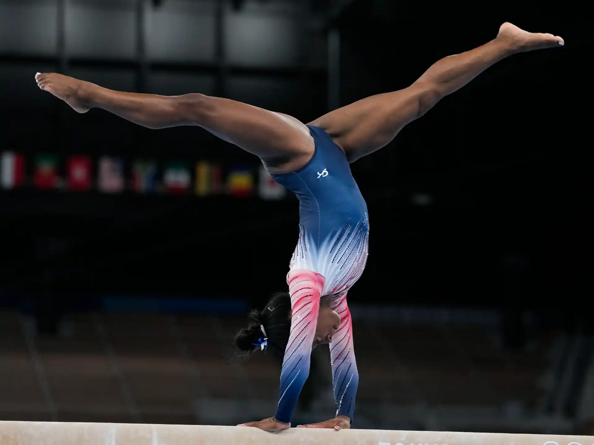 a person doing a handstand