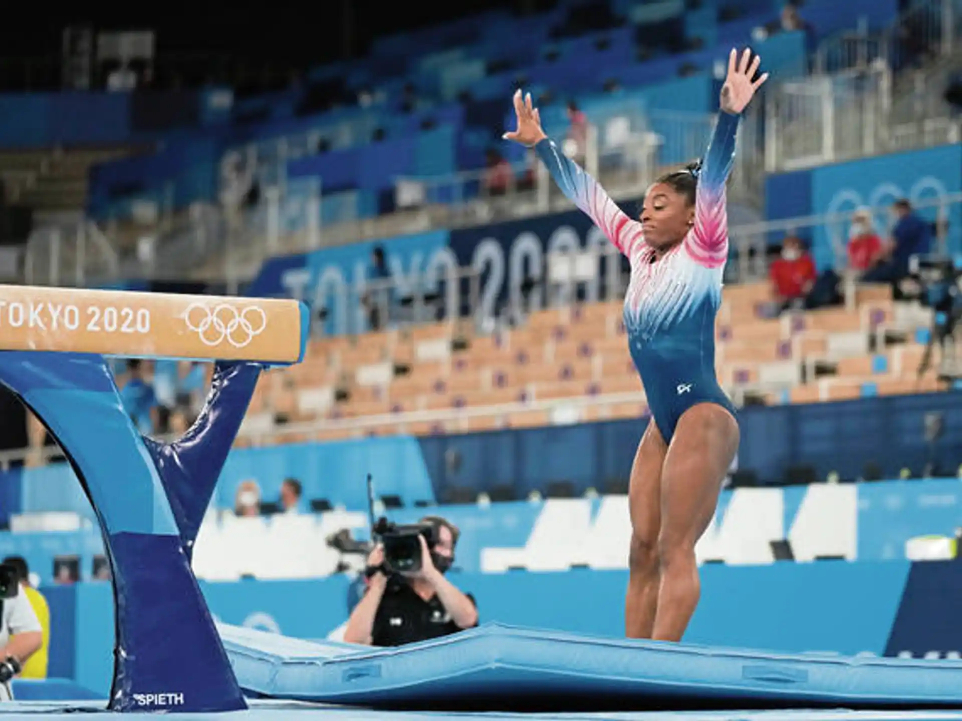 a person jumping on a stage