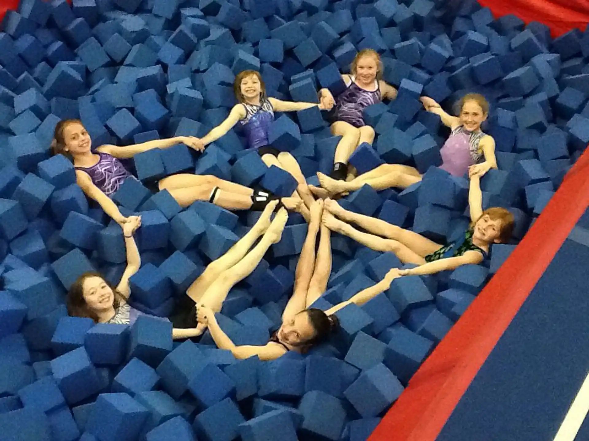 a group of people in a gym
