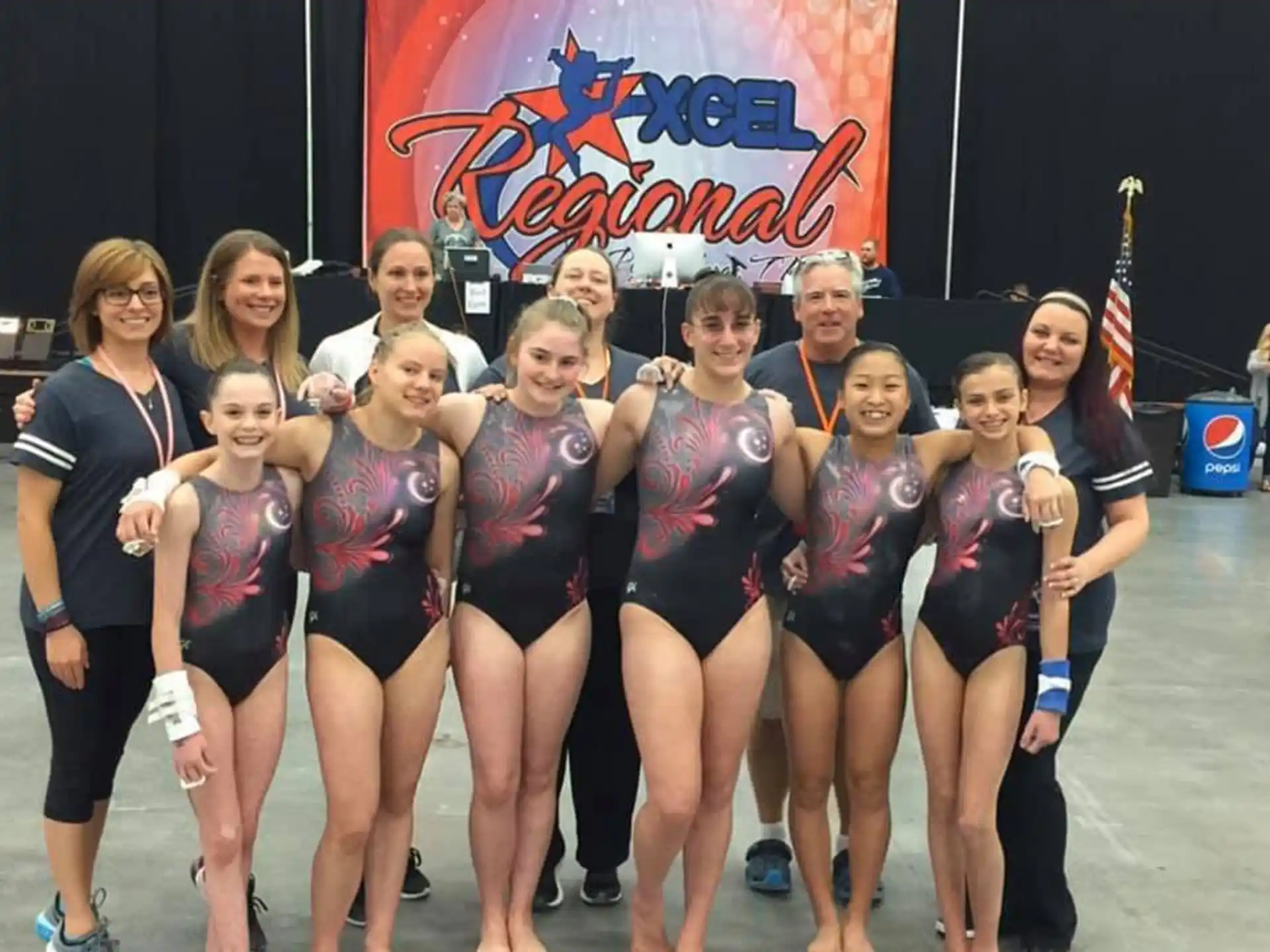 a group of women in athletic wear