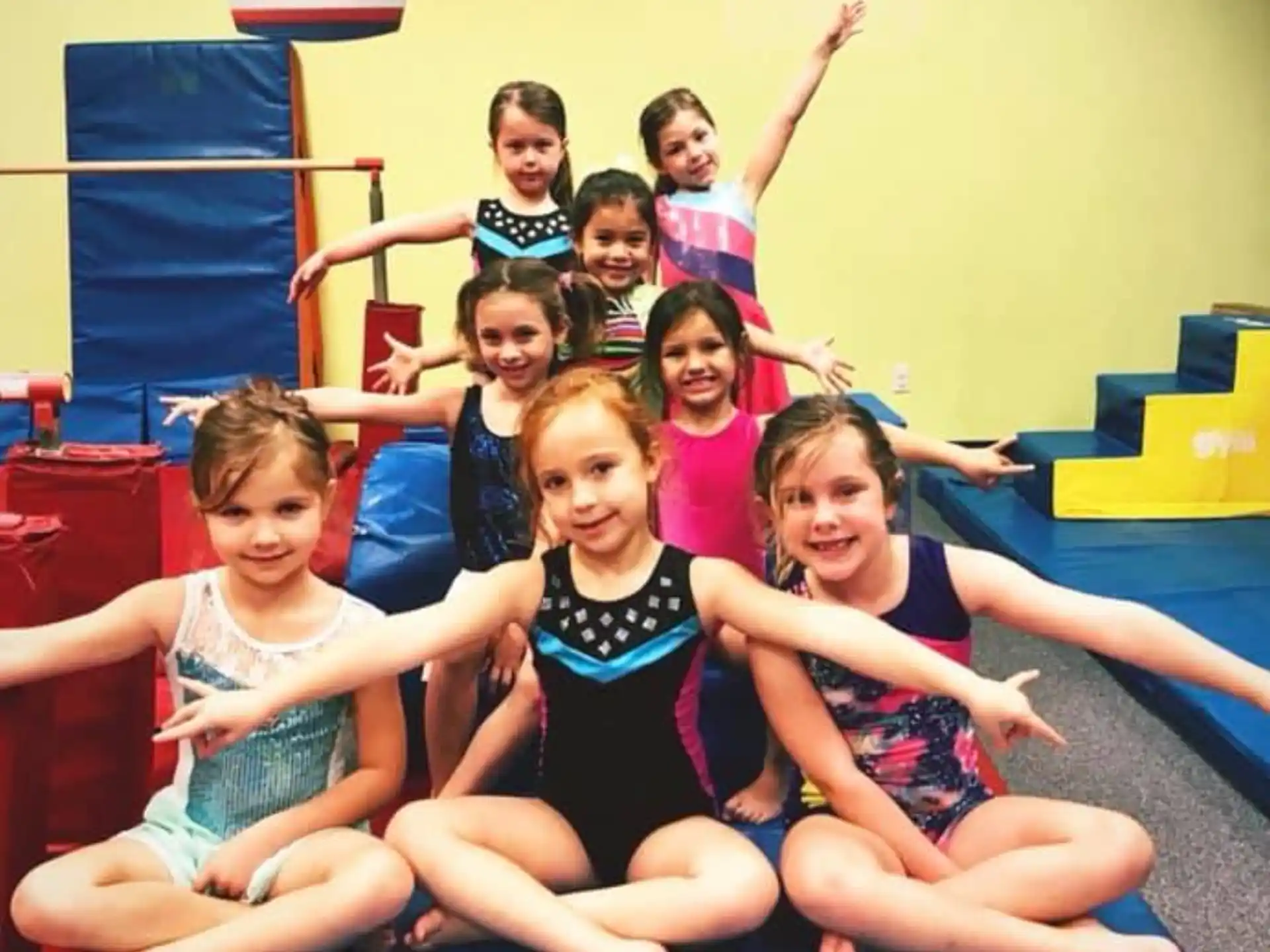 a group of girls posing for a photo