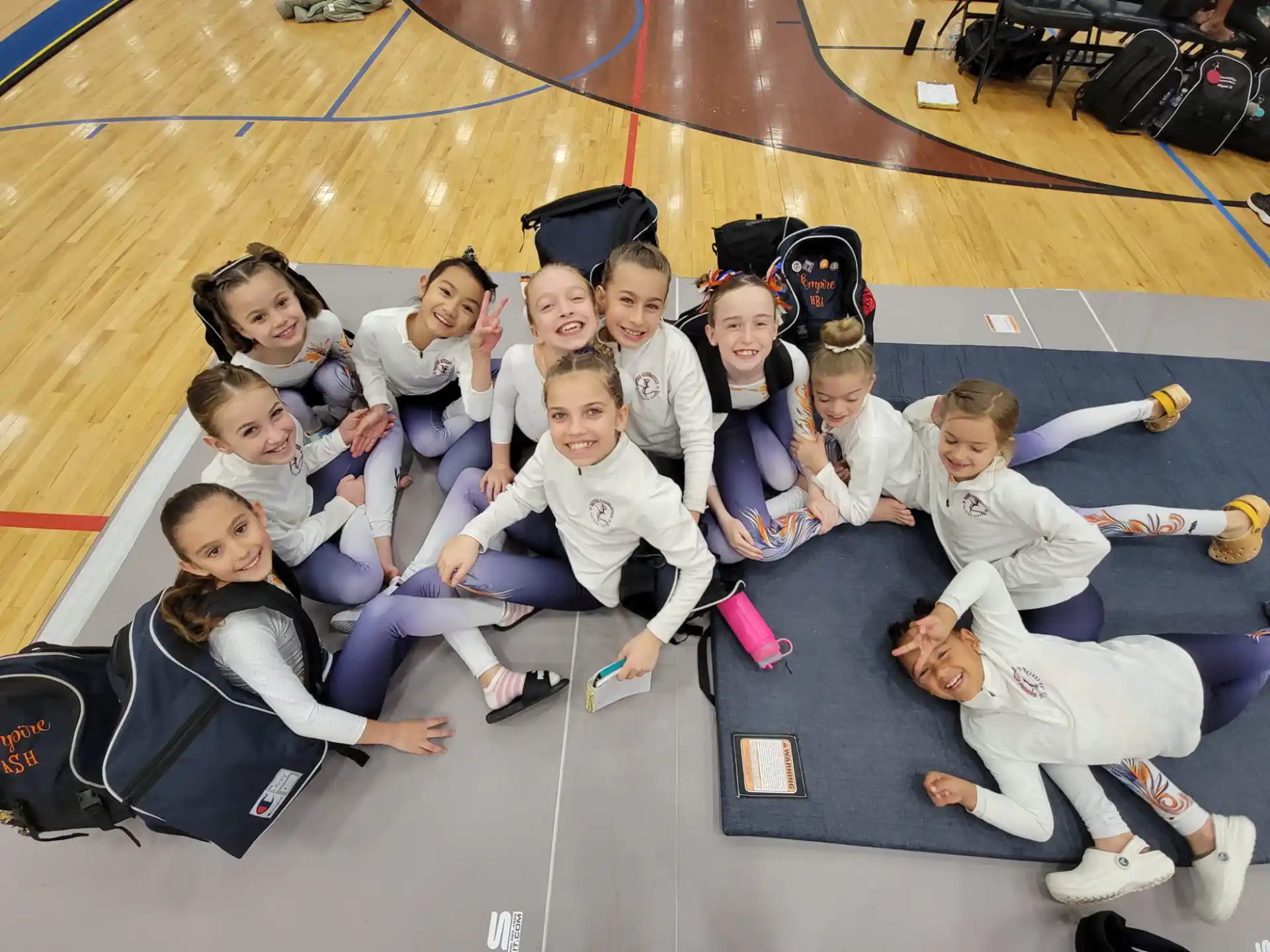 a group of children sitting on the floor