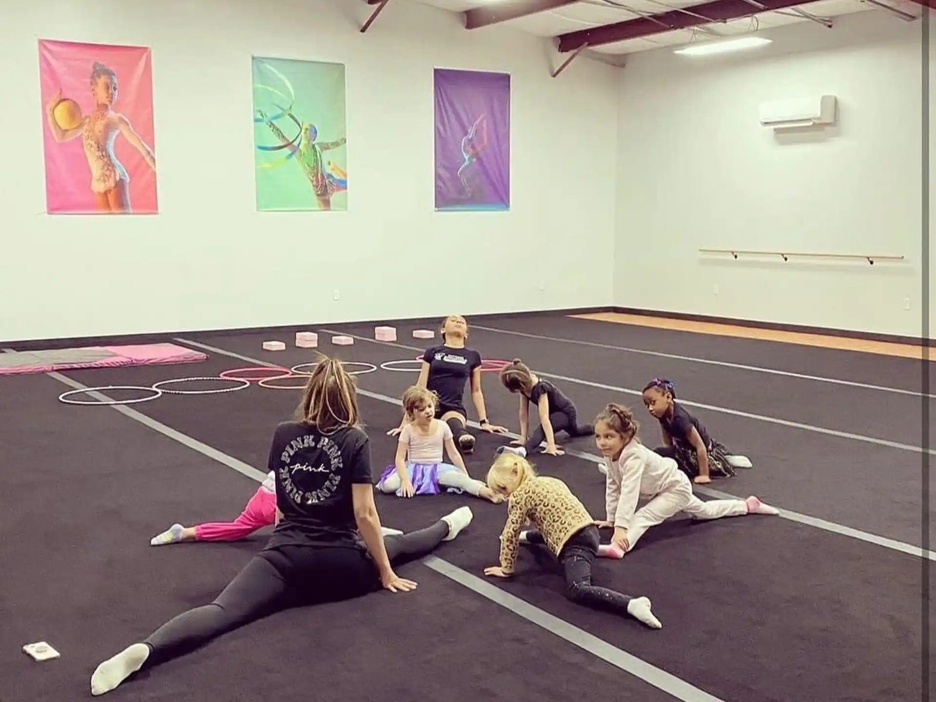 a group of people sitting on the floor