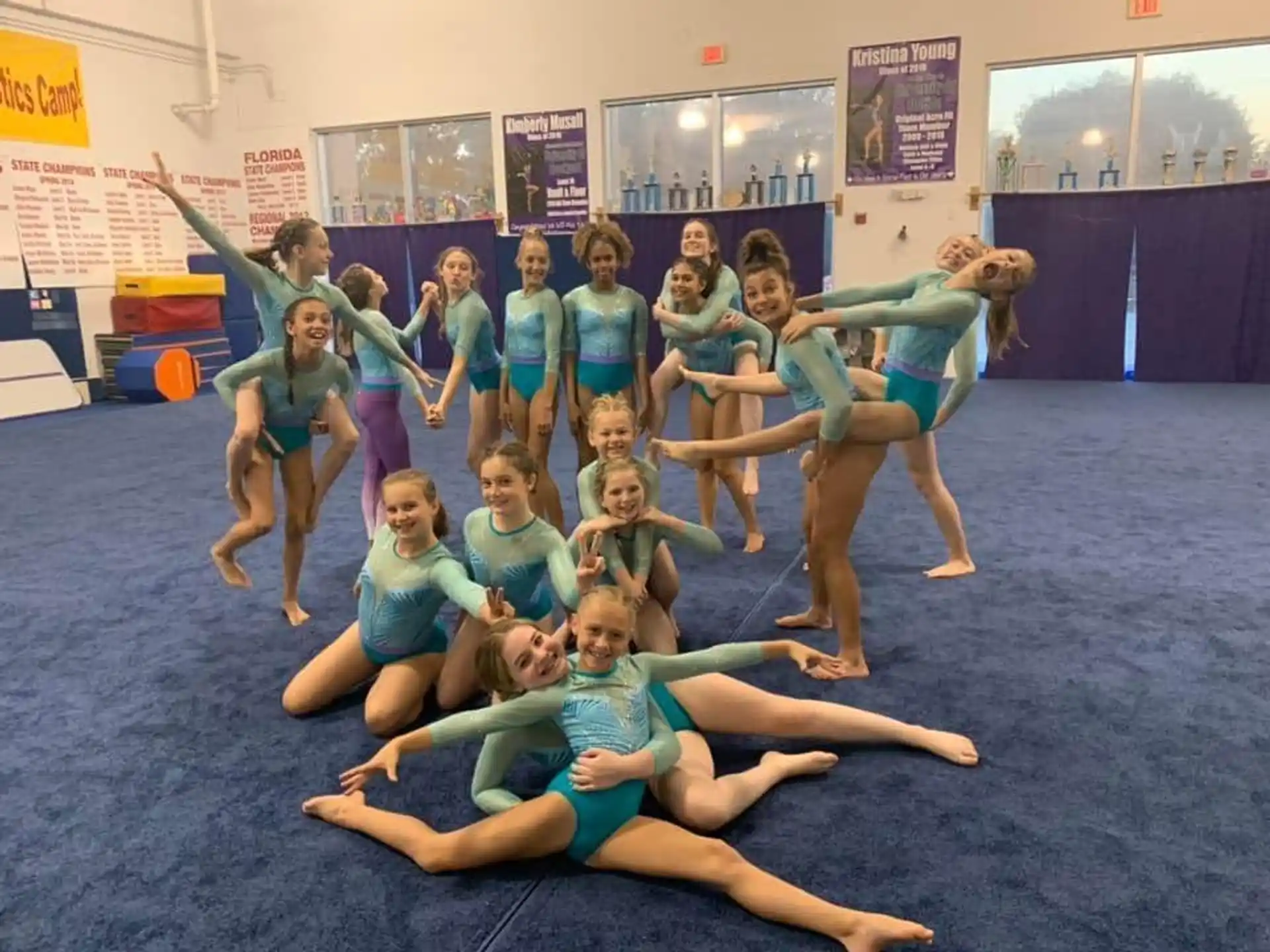 a group of girls posing for a photo