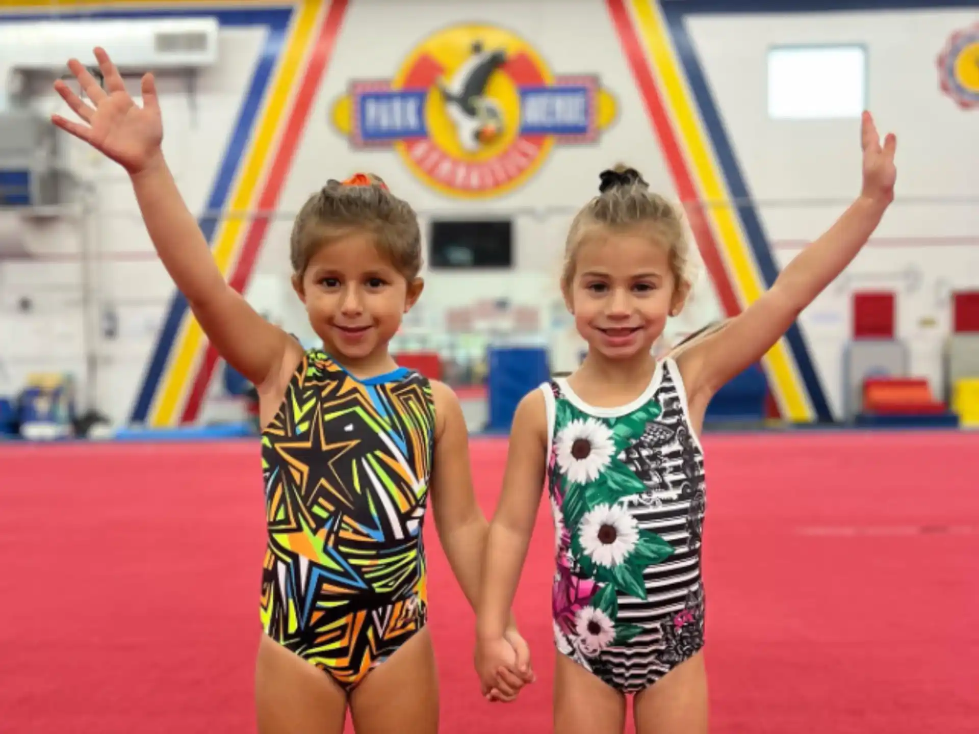 a couple of children posing for the camera
