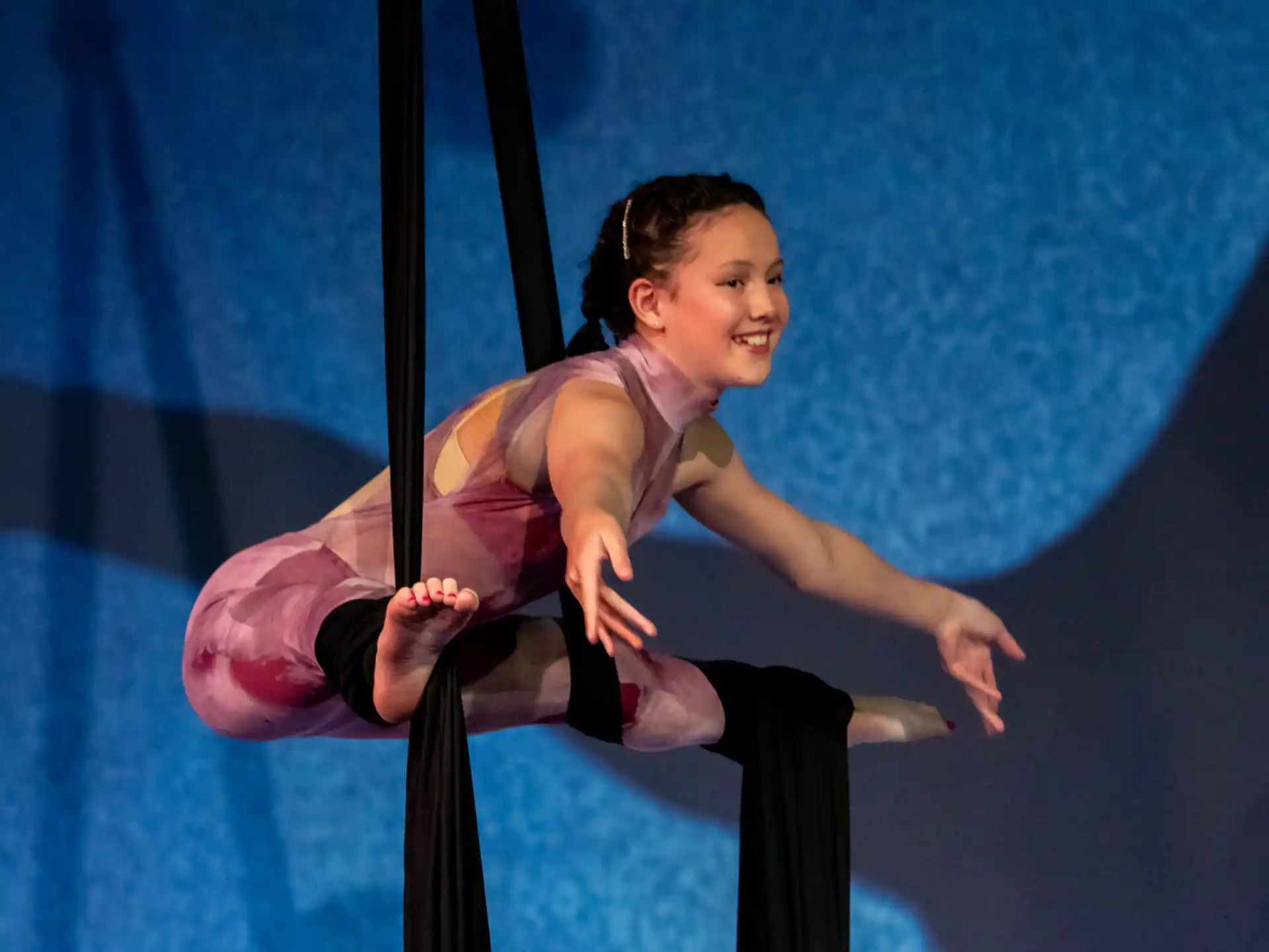 a person sitting on a swing