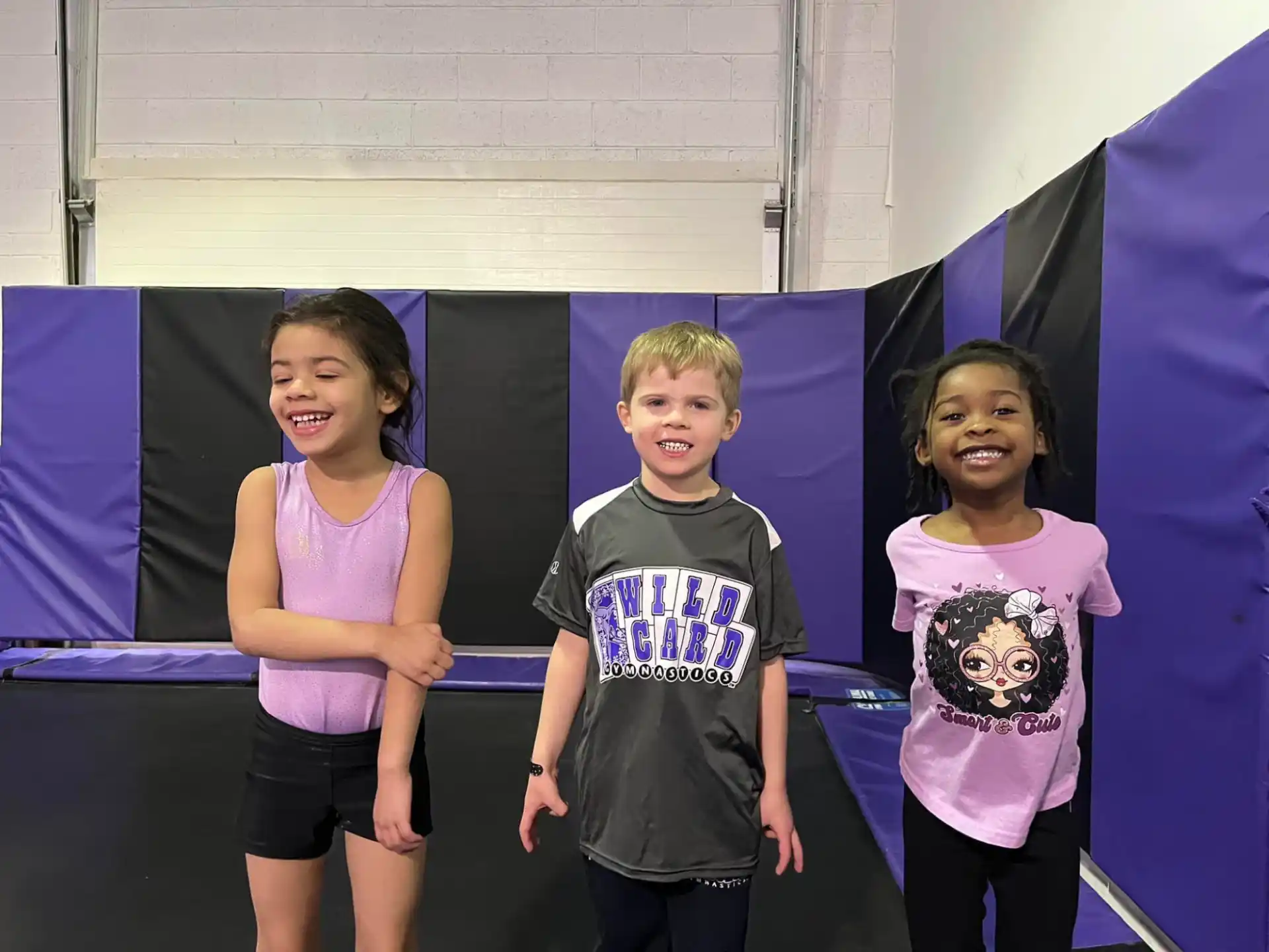 a group of children posing for a photo