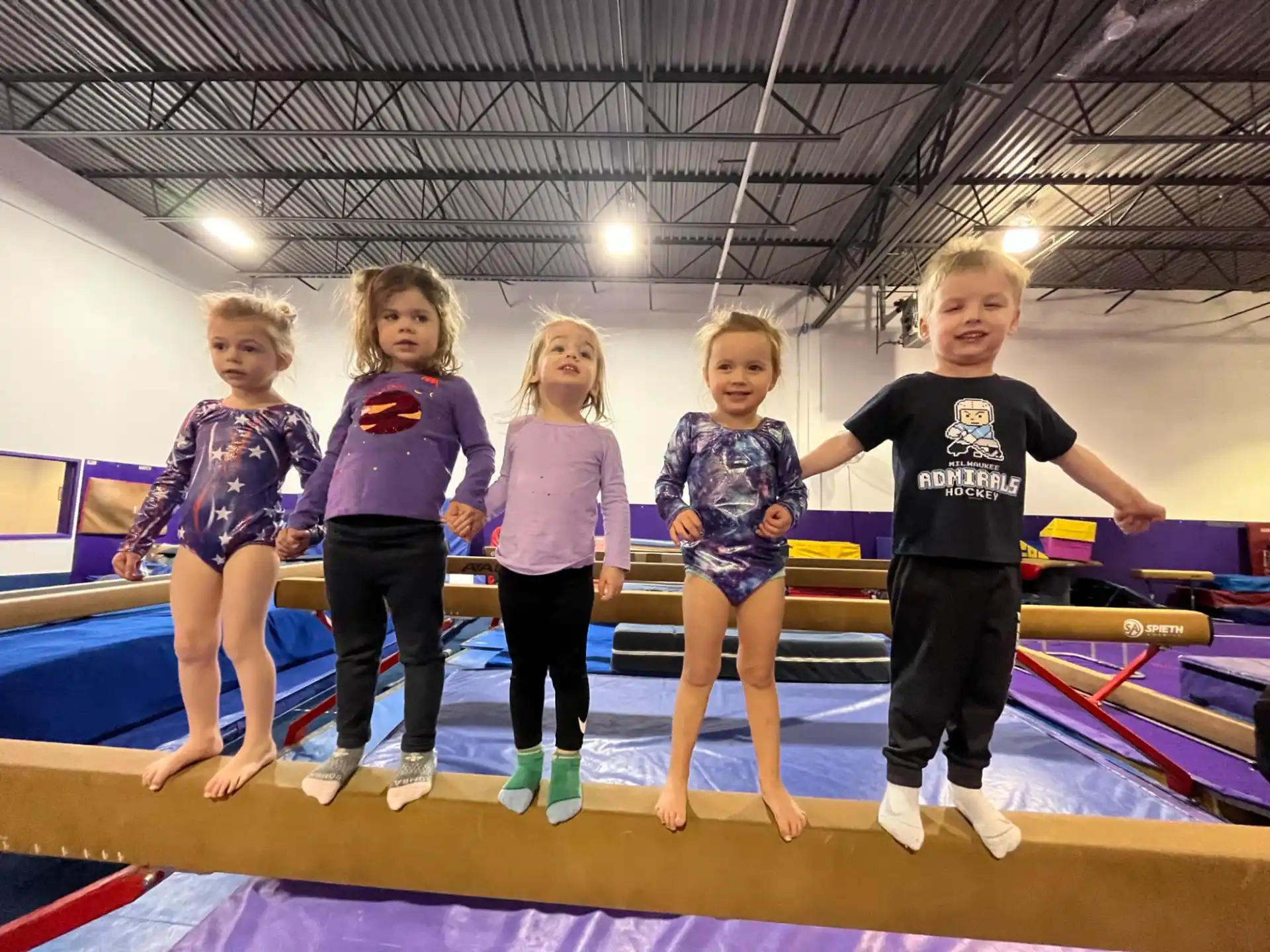 a group of children posing for a photo