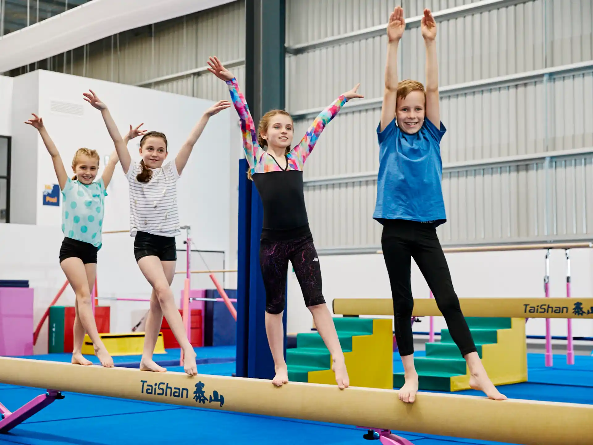 a group of women jumping on a trampoline