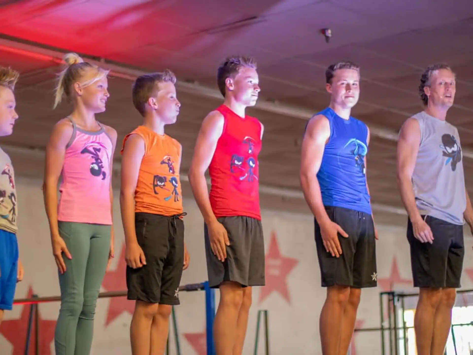 a group of people standing on a stage