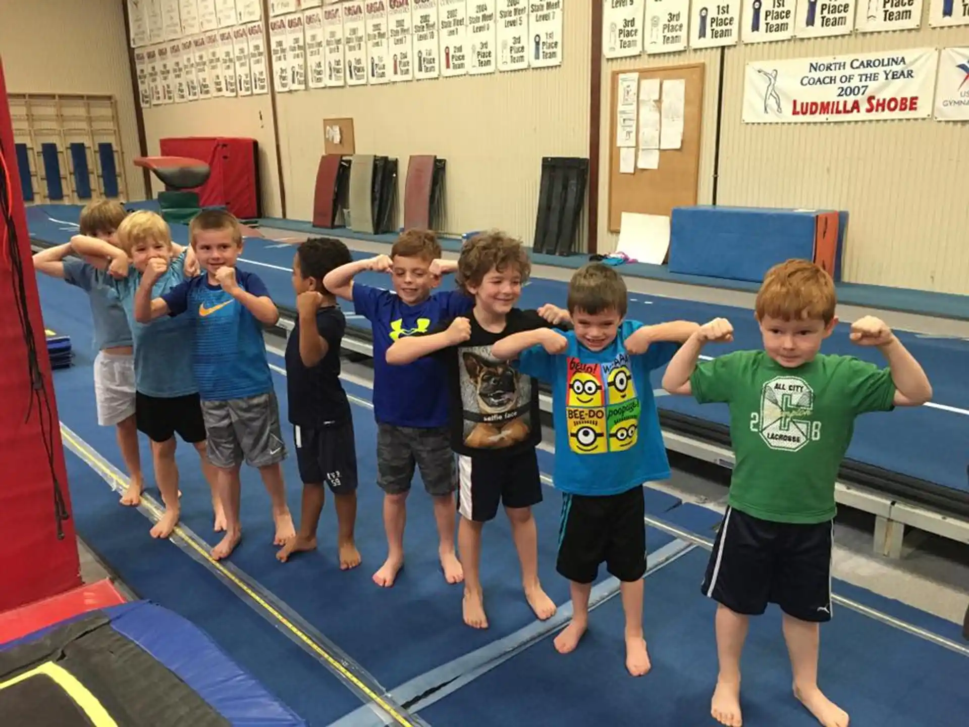 a group of boys in a gym