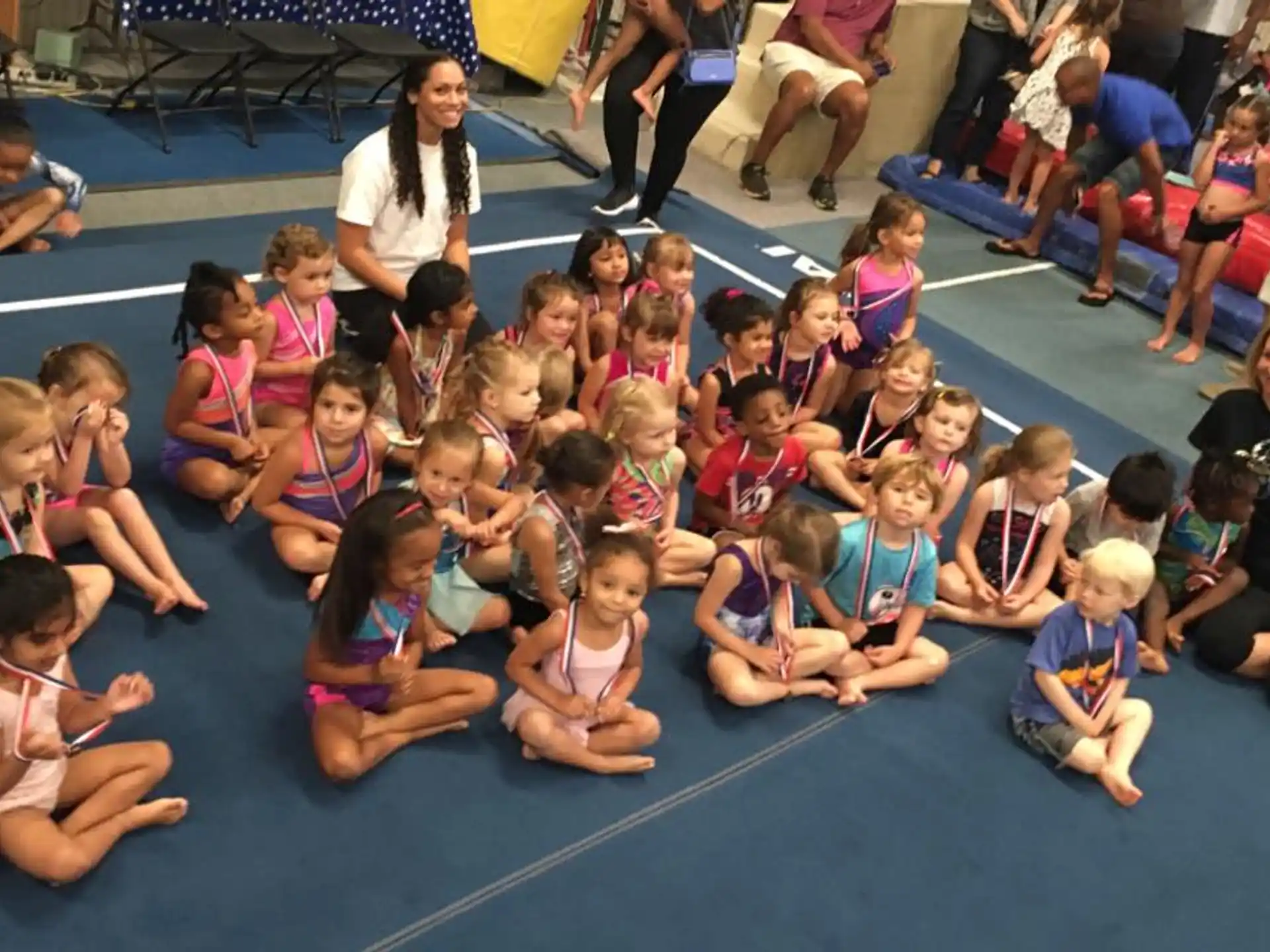 a group of children sitting on the floor