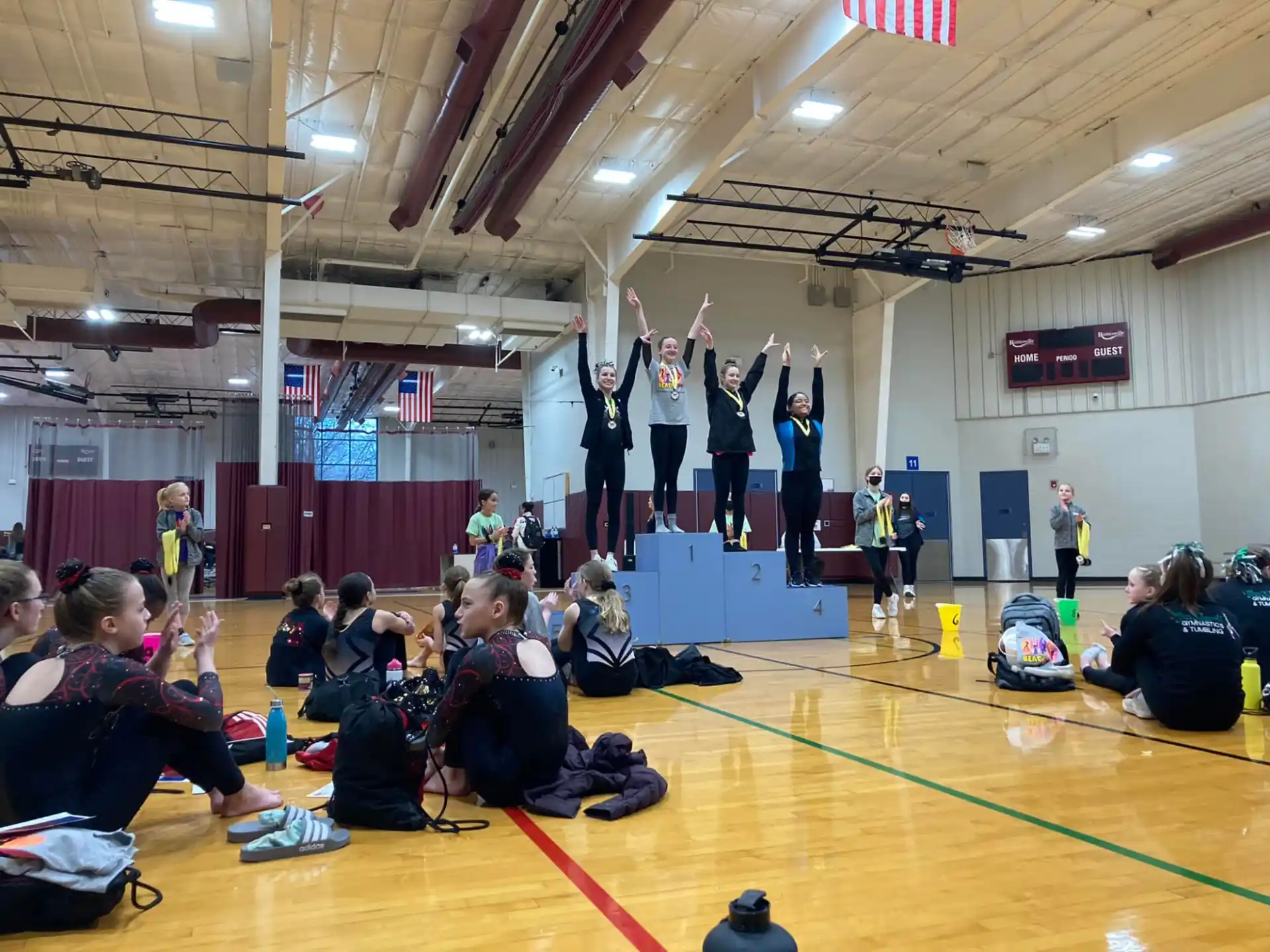 a group of people on a gym