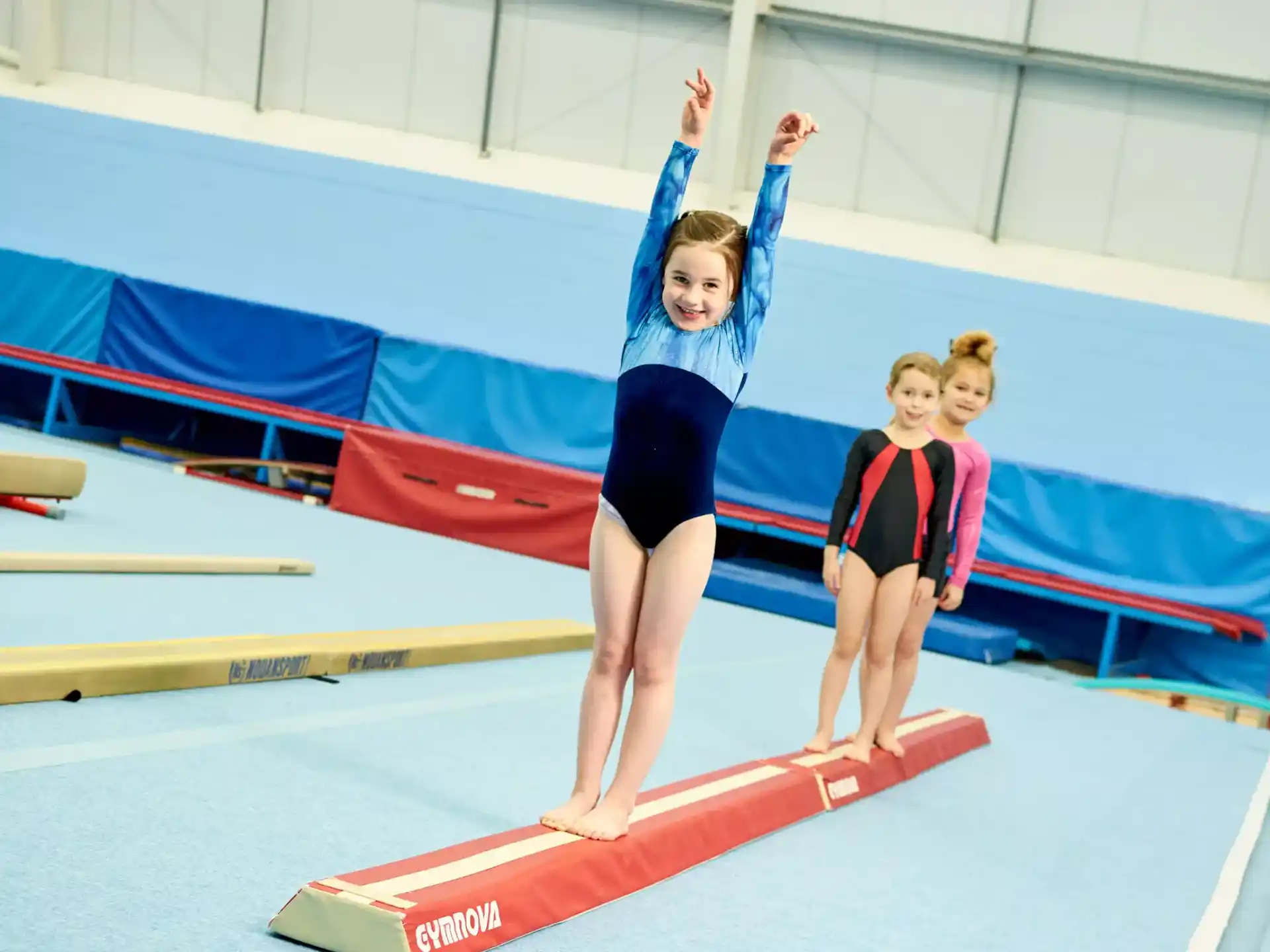 a woman doing gymnastics