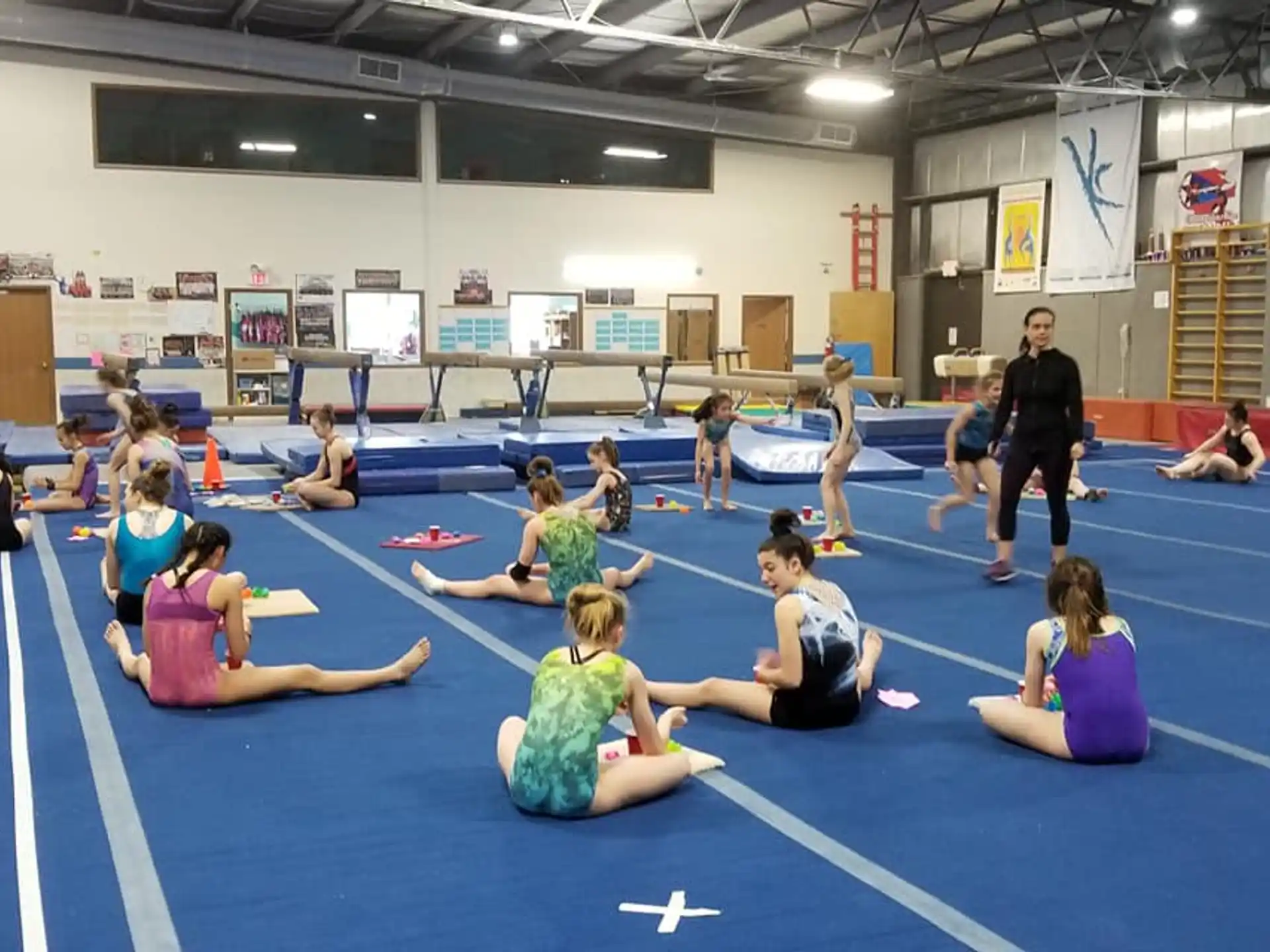 a group of people in a gym