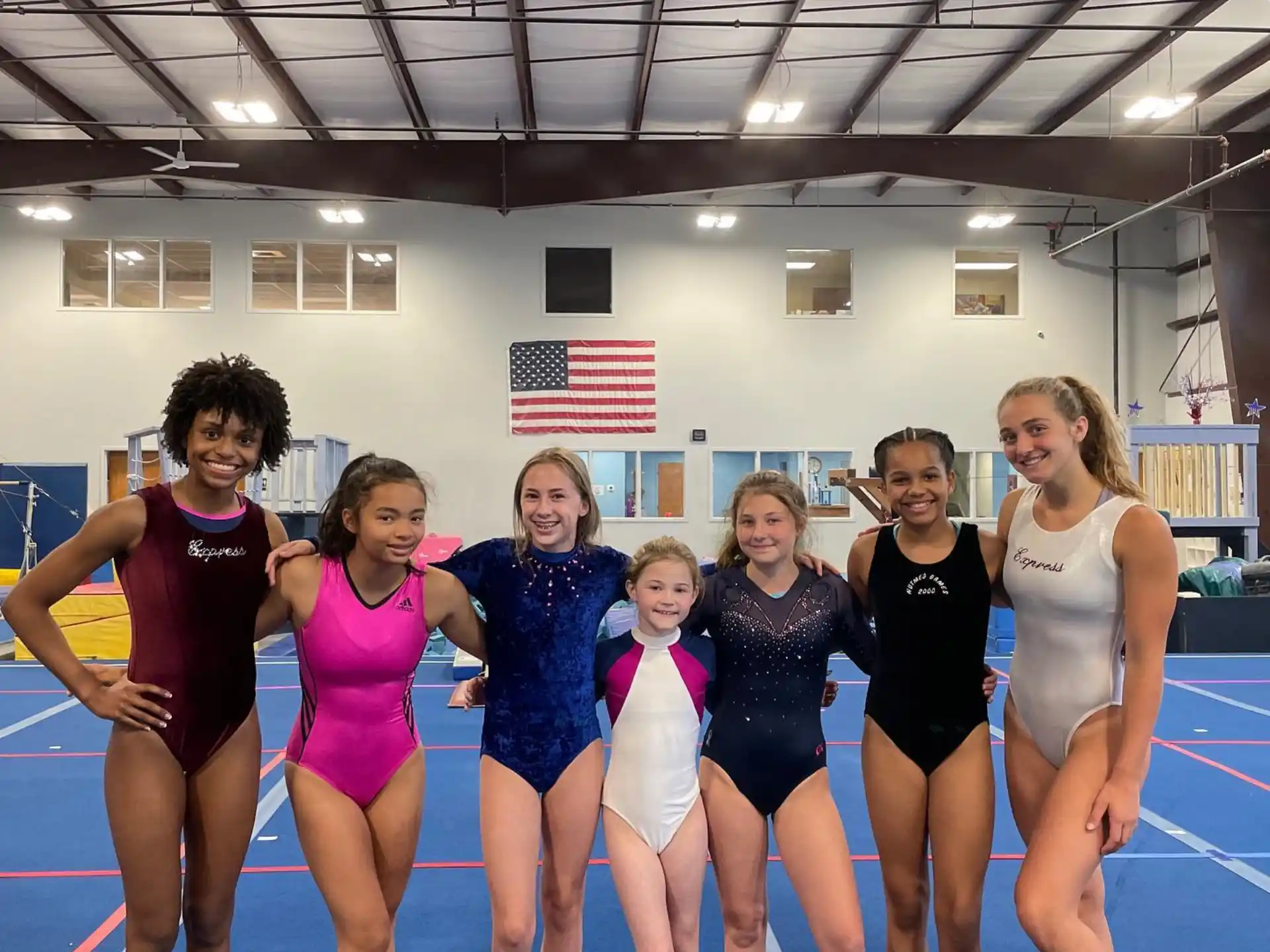 a group of women in a gym