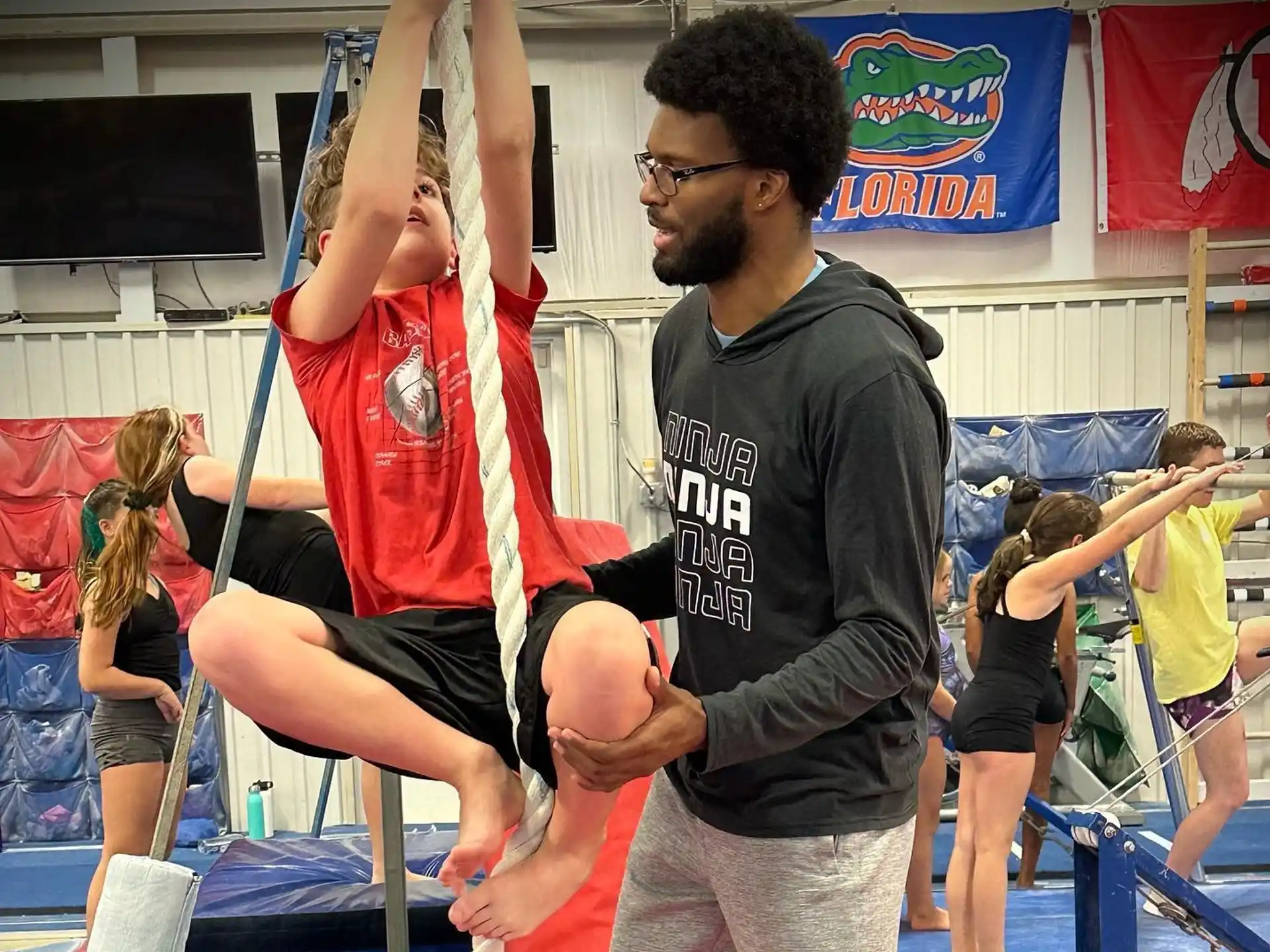 a man lifting a woman up