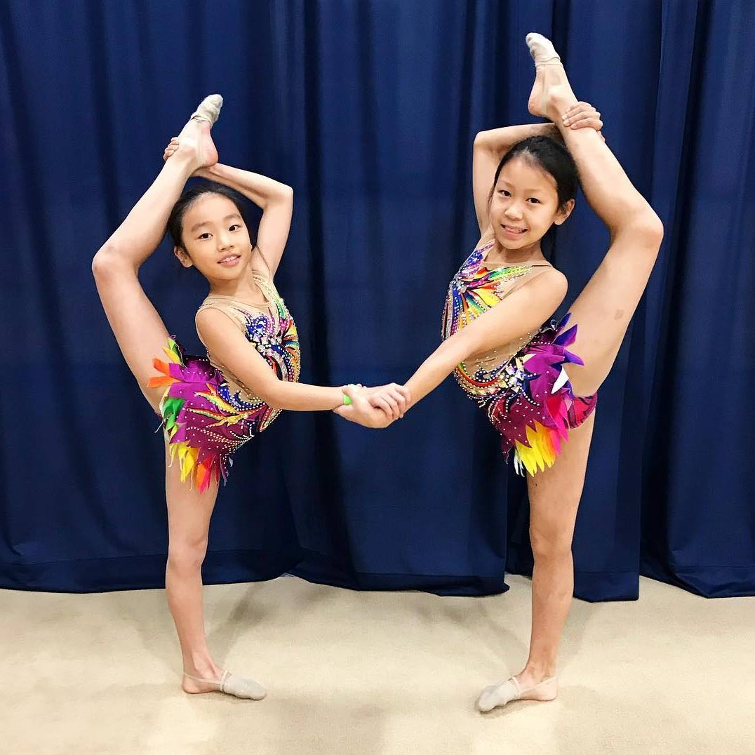 two girls wearing clothing