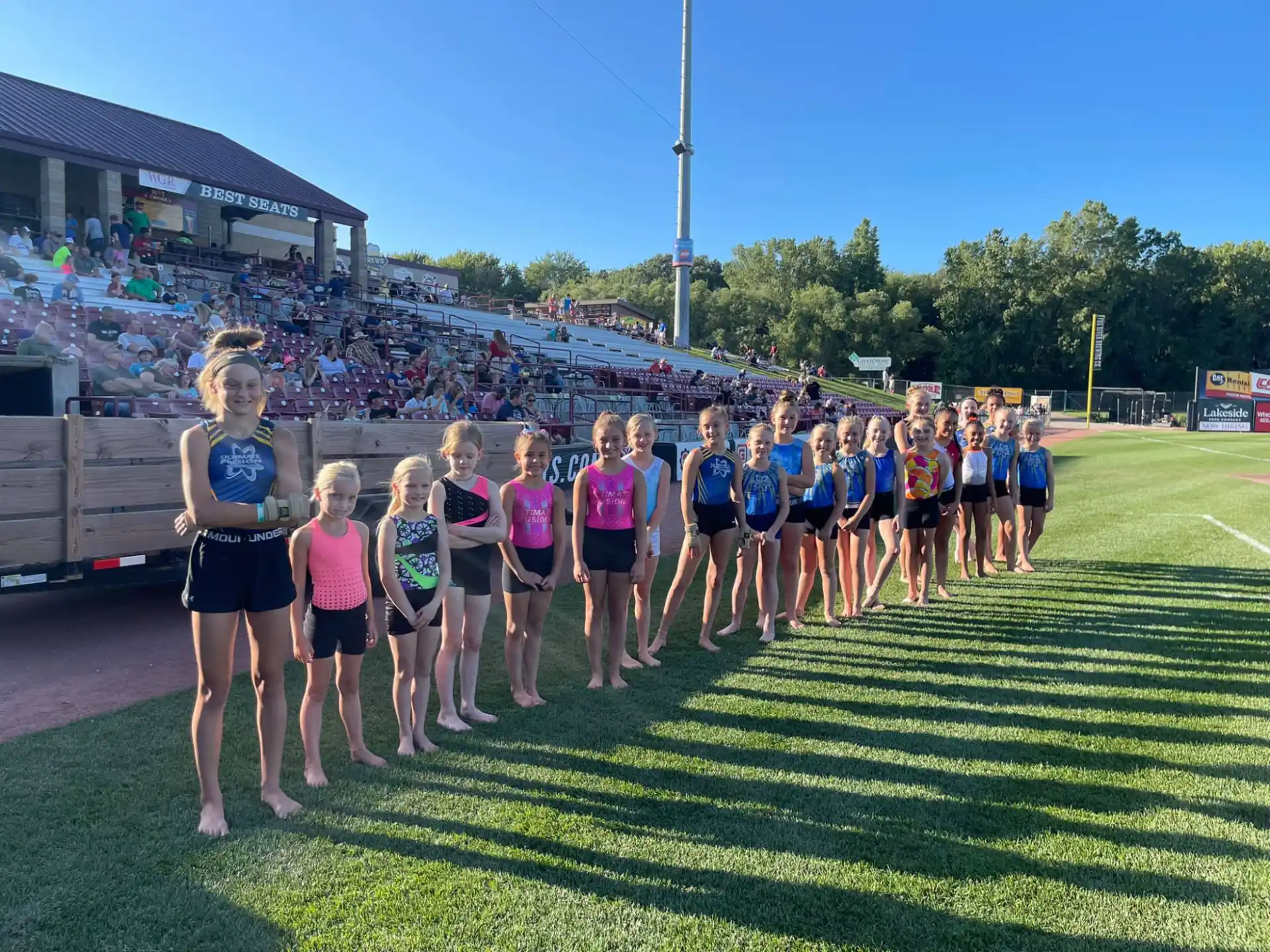 a group of people standing on a track