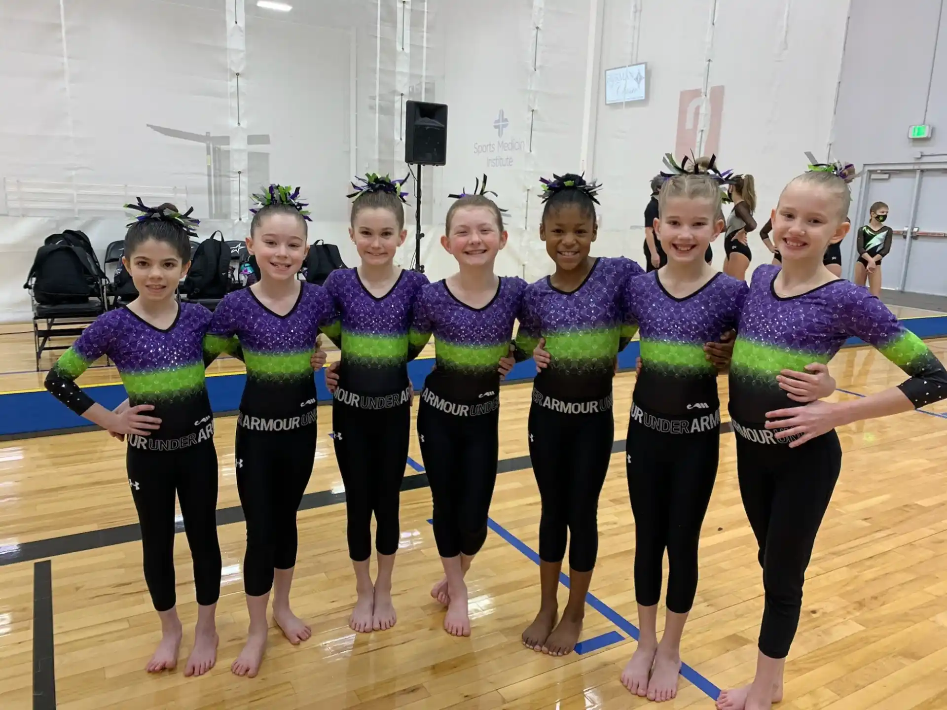 a group of girls in a gym