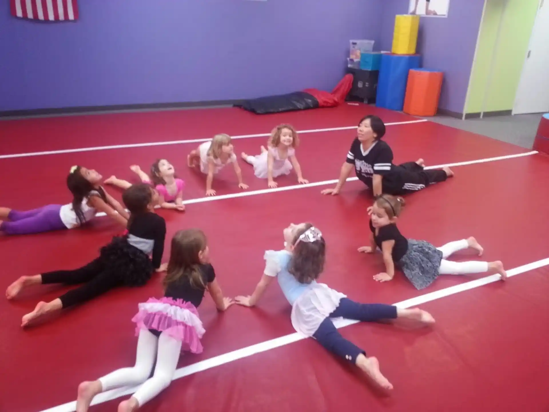 a group of people on a mat