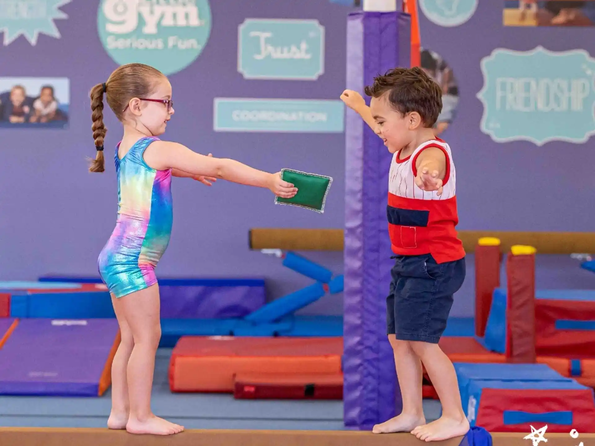 a boy and girl on a stage