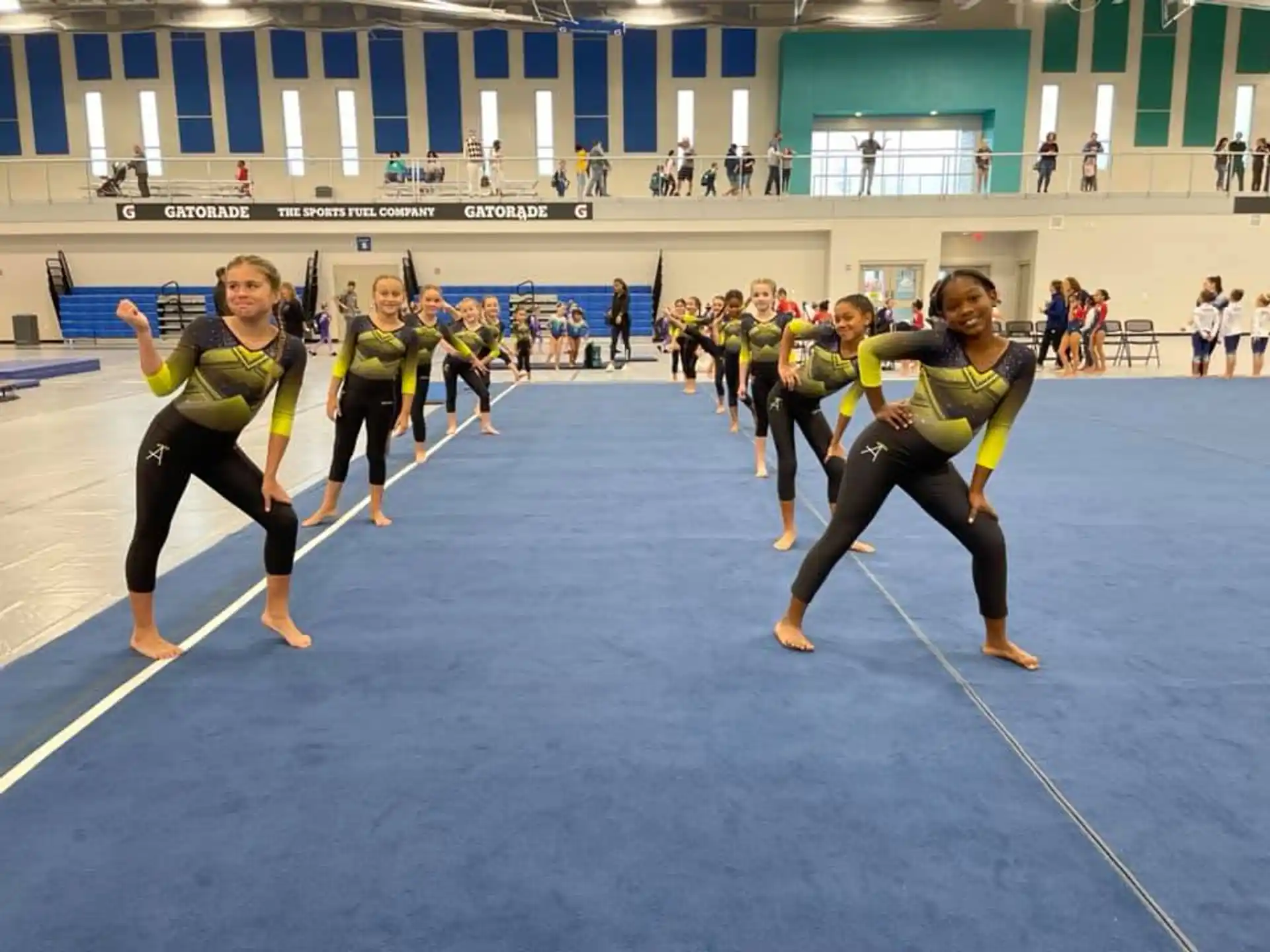 a group of people in a gym