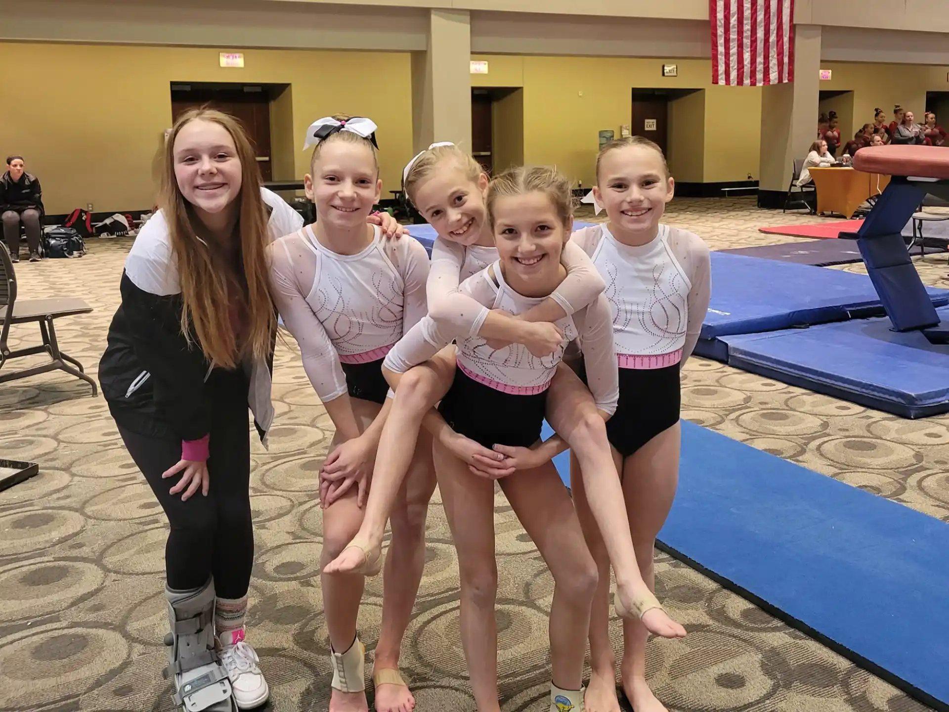 a group of girls posing for a photo