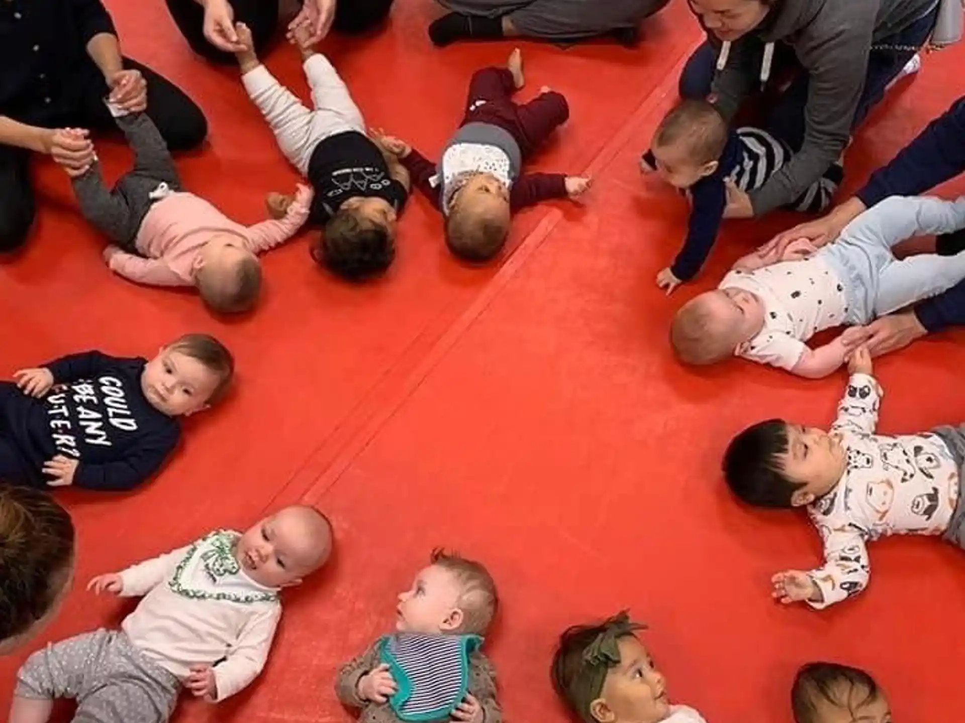 a group of people sitting on the floor