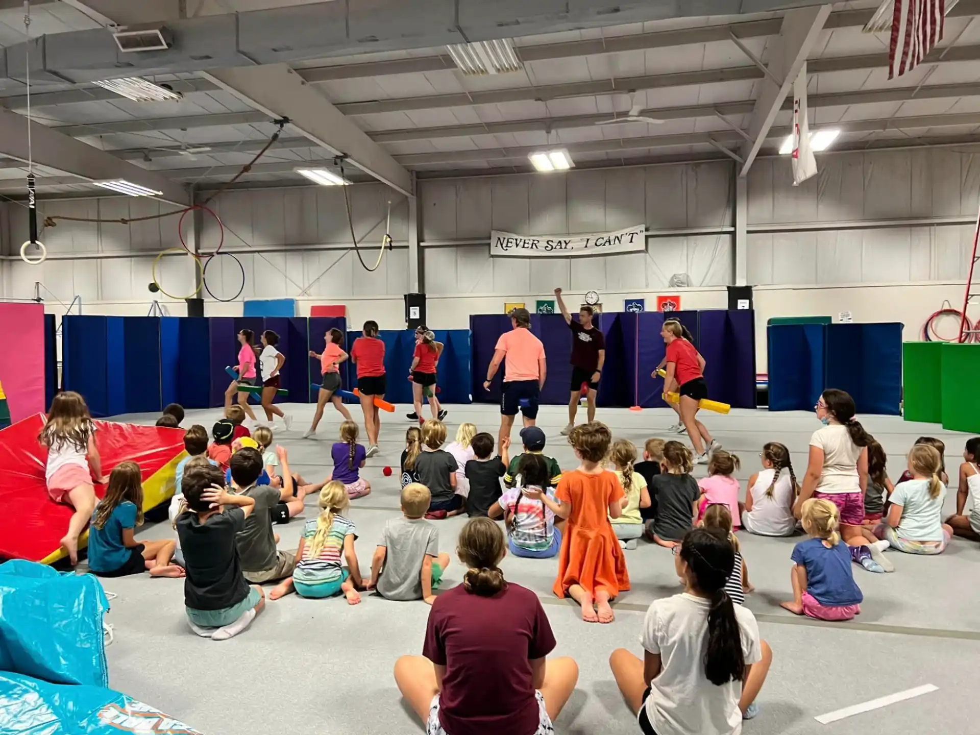 a group of people in a gym