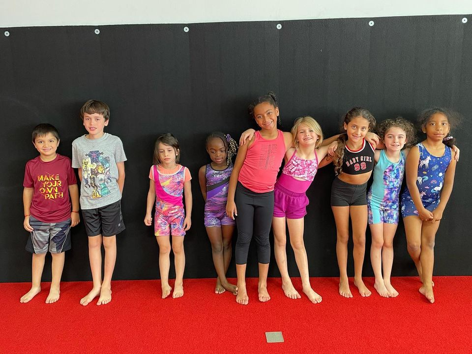 a group of children posing for a photo