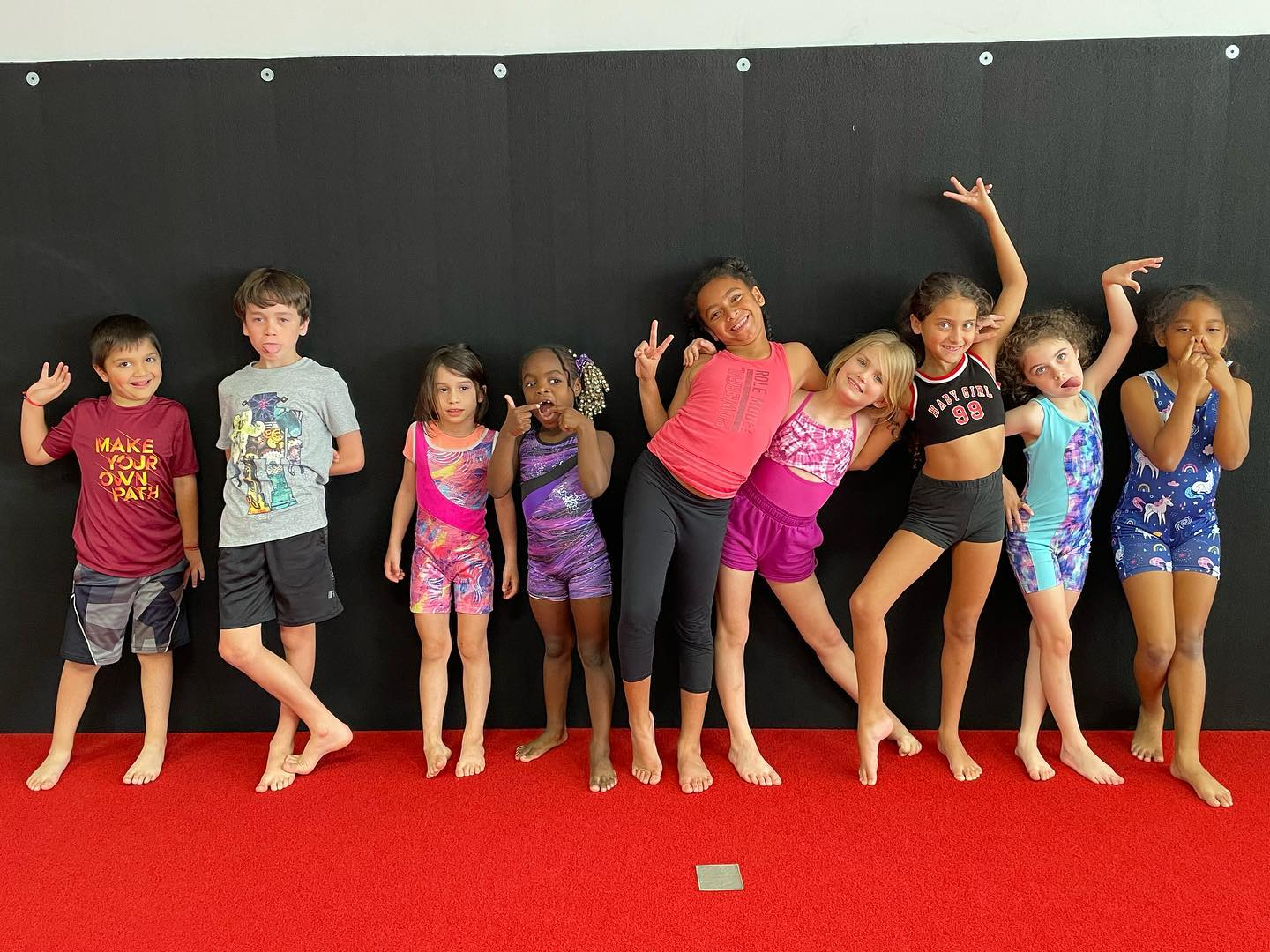 a group of children posing for a photo