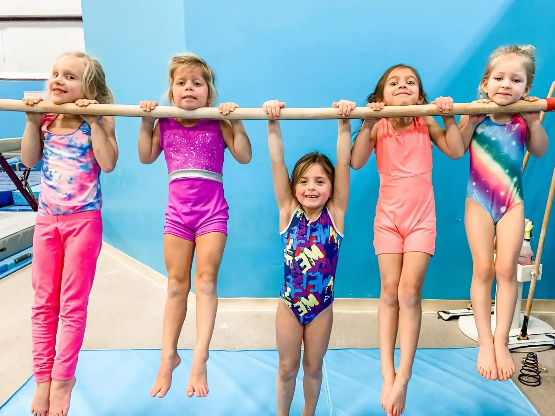a group of girls posing for a photo