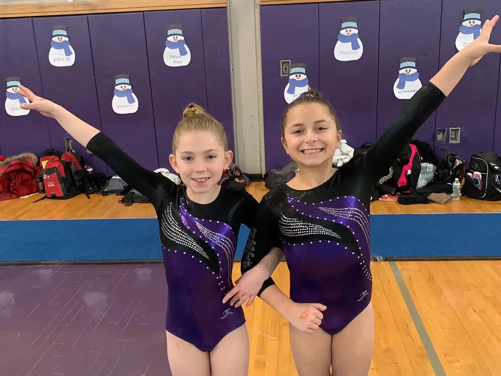 two girls in leotards